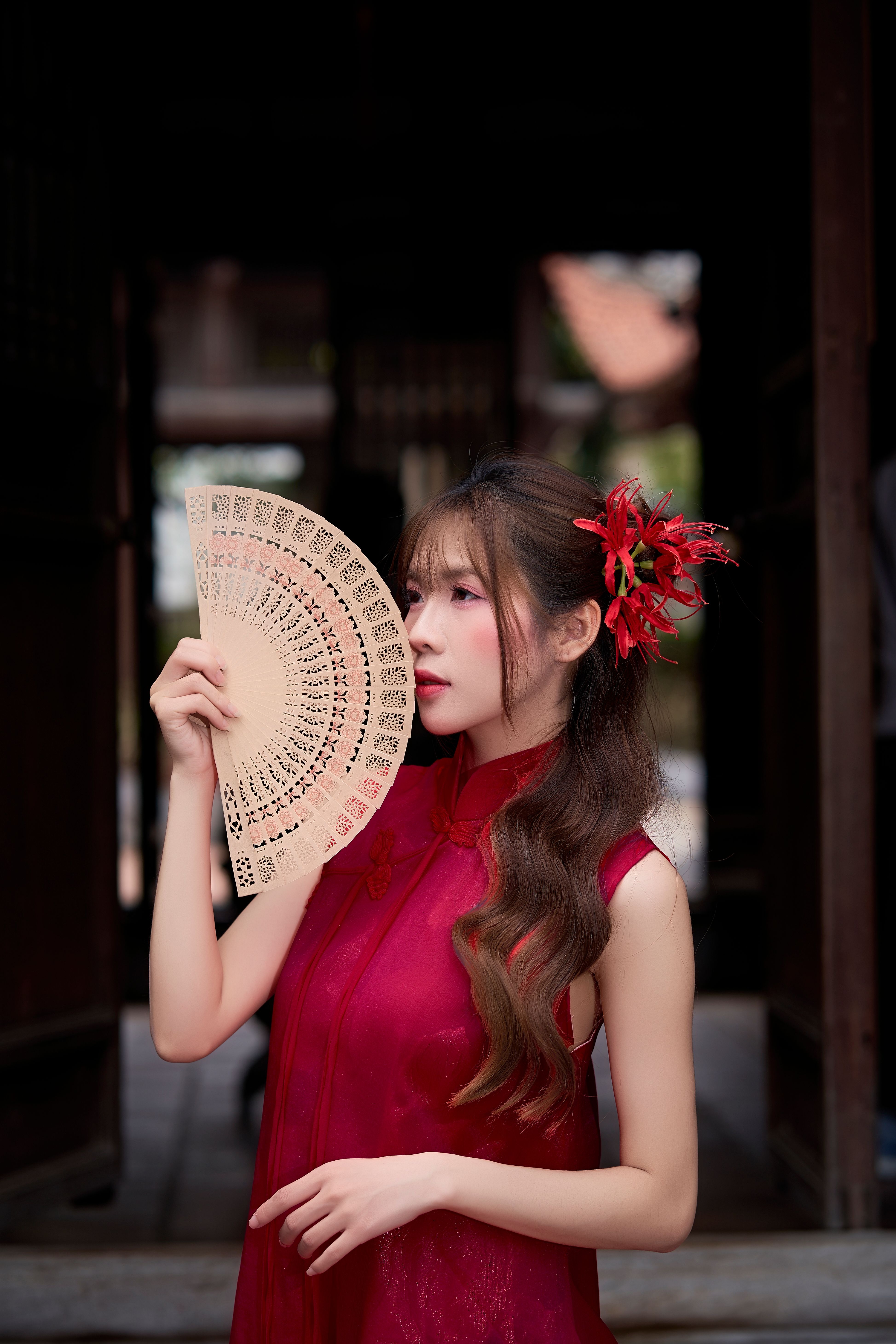 Elegant Woman with Fan in Traditional Dress · Free Stock Photo