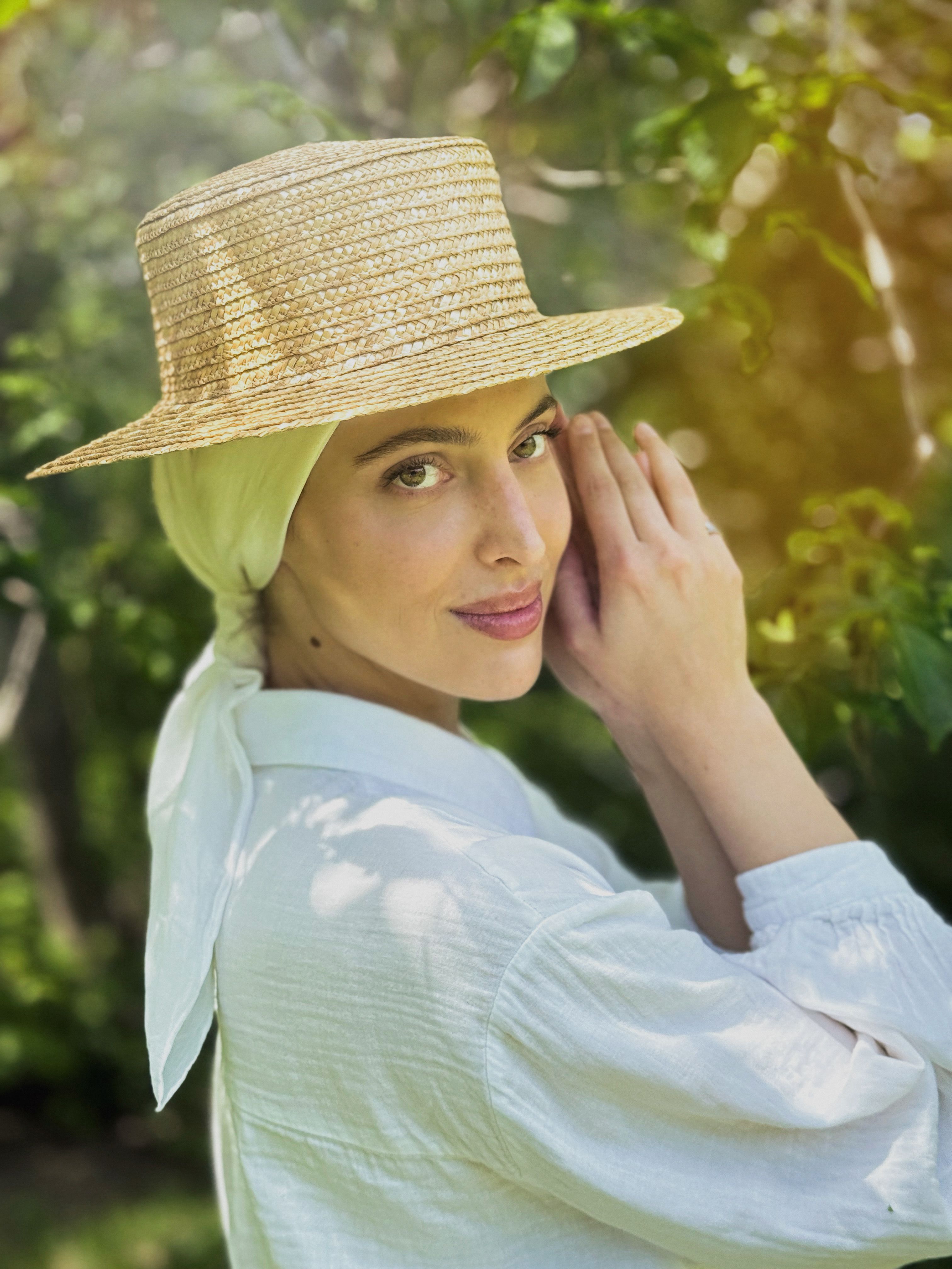 Elegant Woman in Straw Hat Enjoying Nature · Free Stock Photo