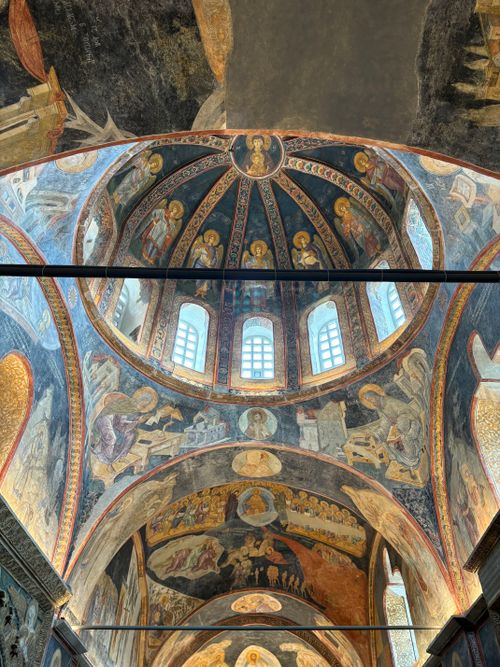 Free Intricate Byzantine frescoes adorn an ancient church dome, capturing religious history. Stock Photo