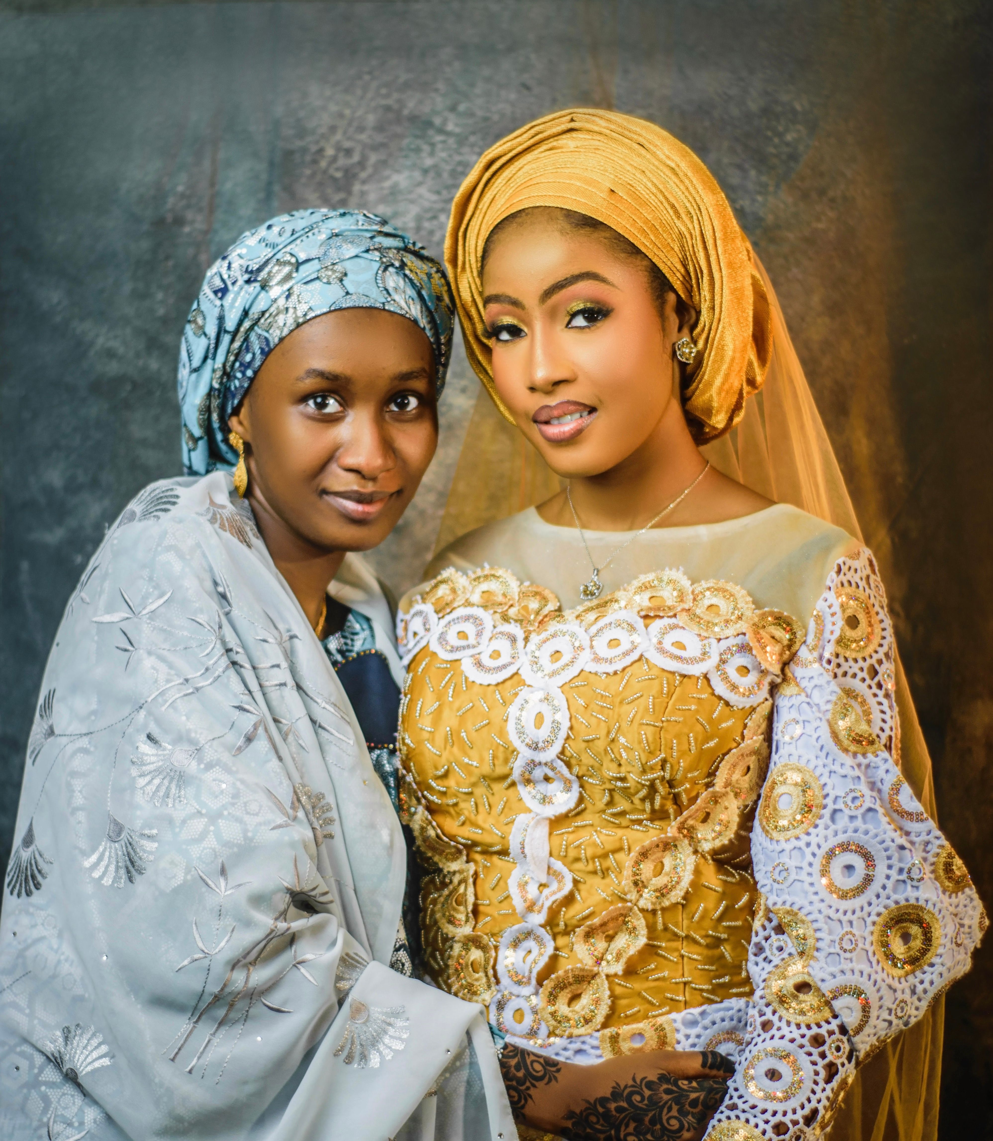 Portrait of Two Women in Traditional Attire · Free Stock Photo