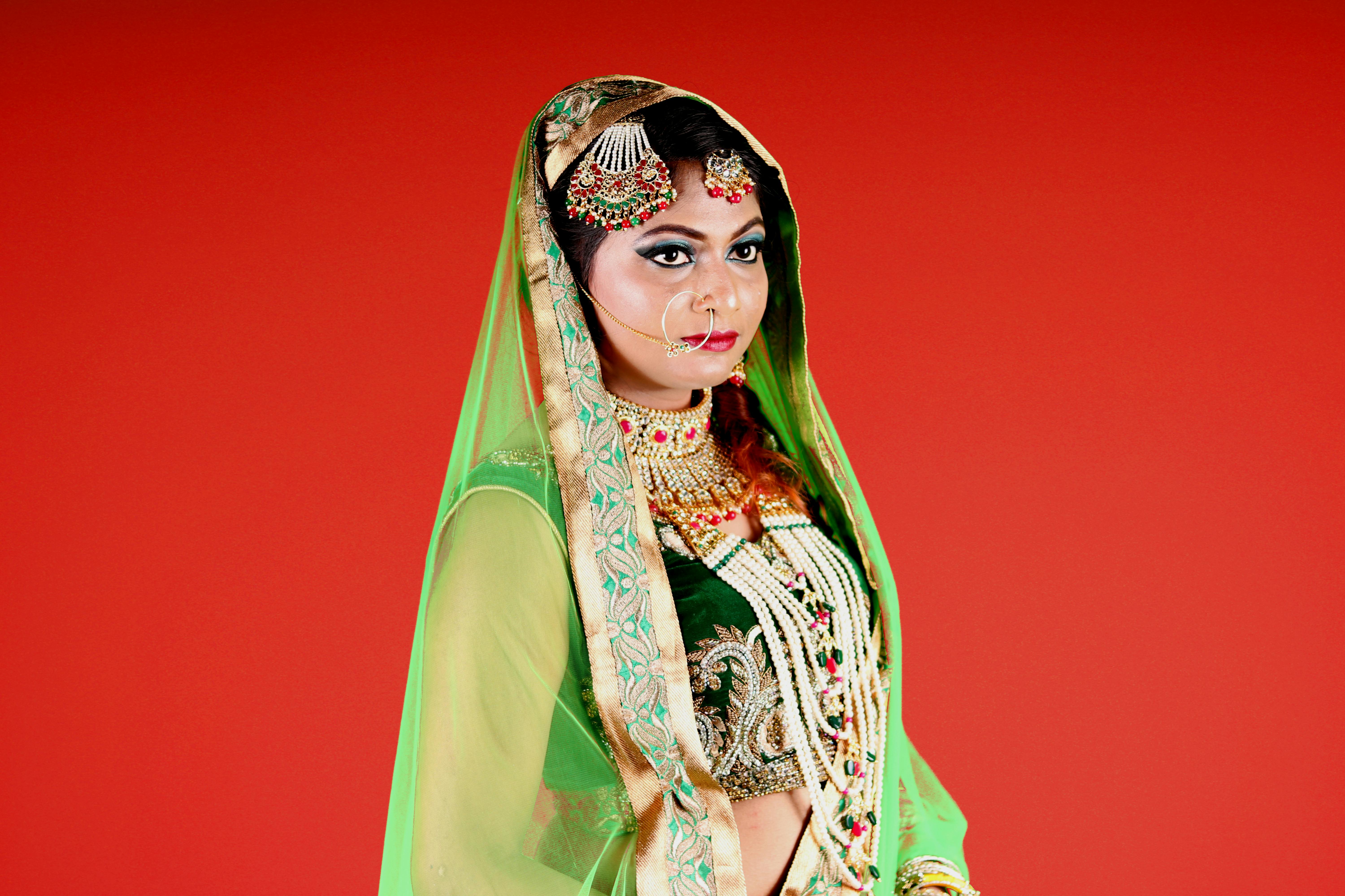 Woman Wearing Green and White Floral Sari Dress