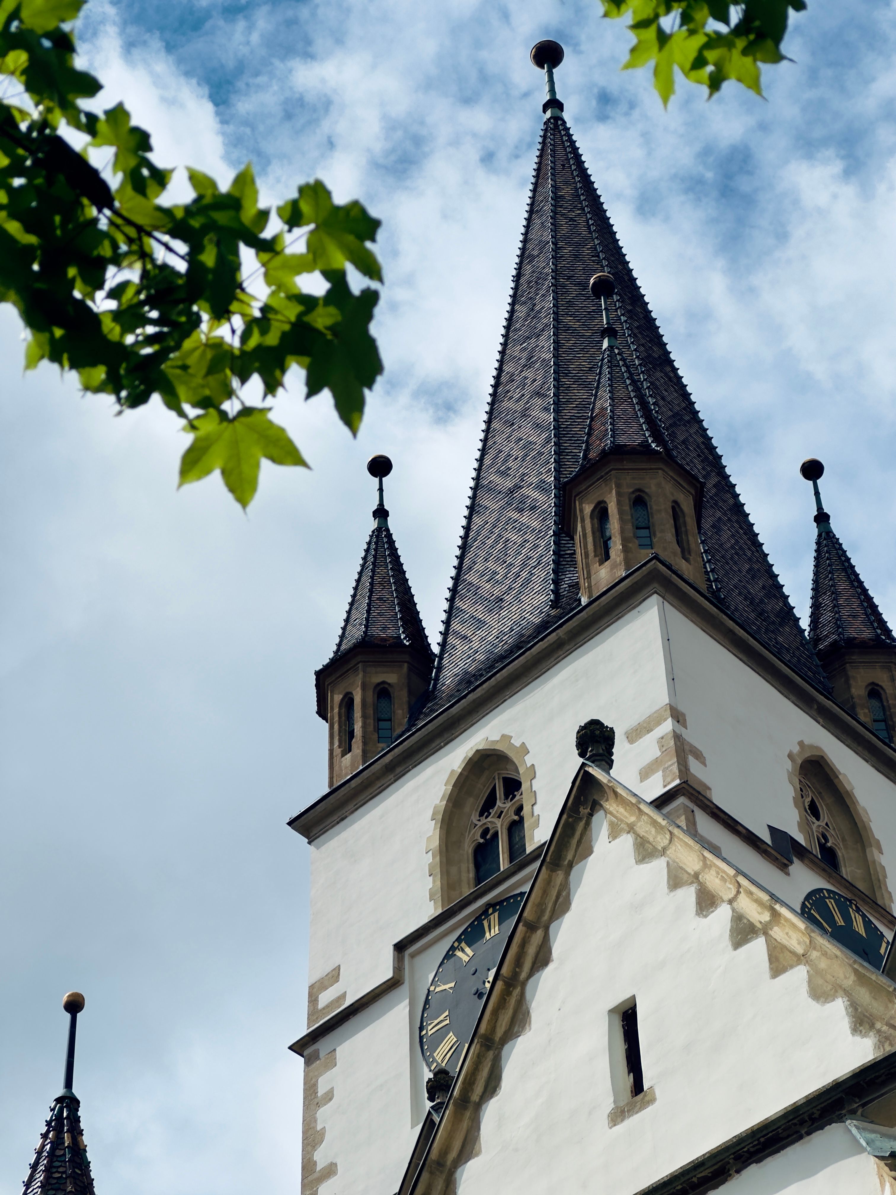 Medieval Church Towers Against Blue Sky · Free Stock Photo