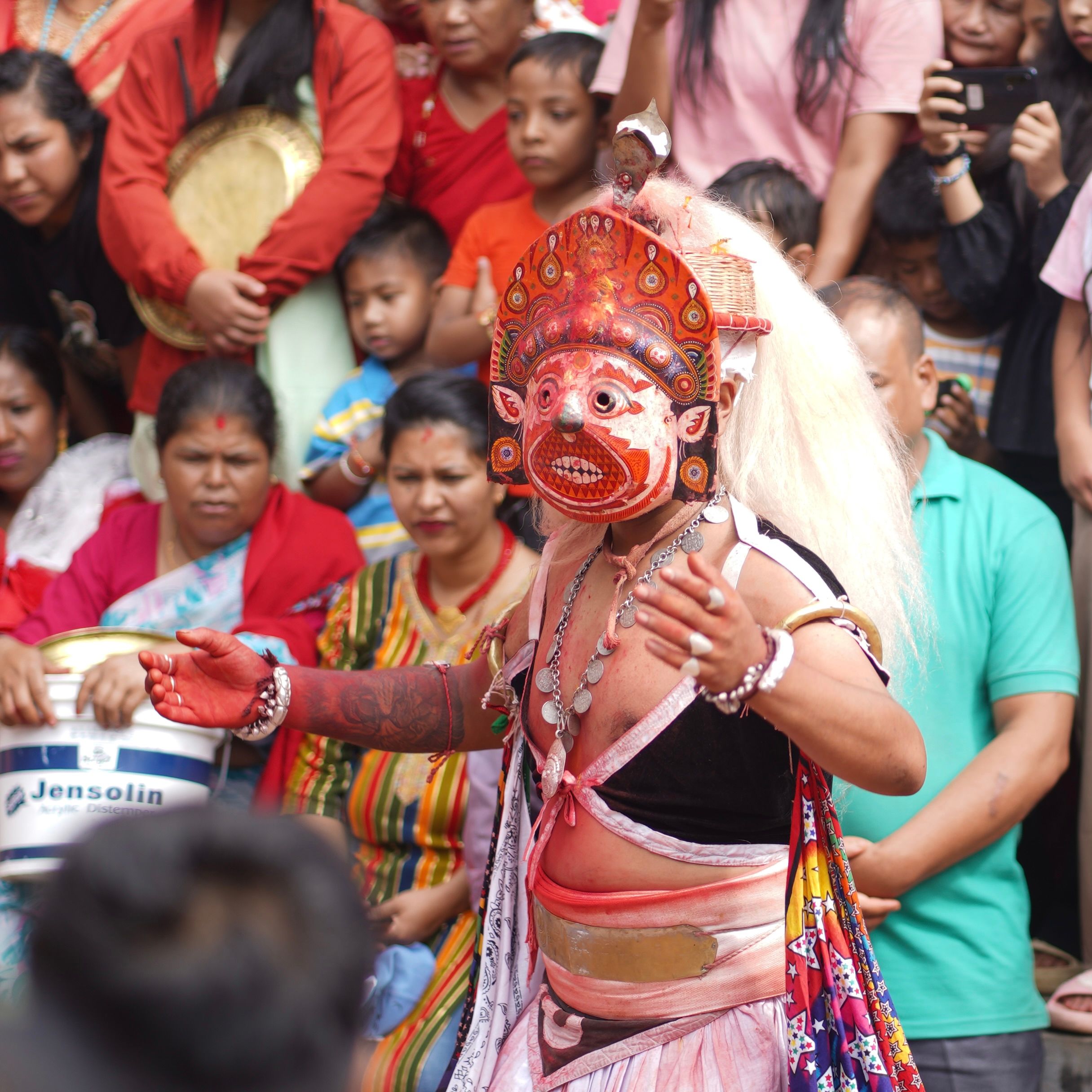 Masked dancers perform at the Nil Barahi dance festival, showcasing Nepalese culture and tradition.