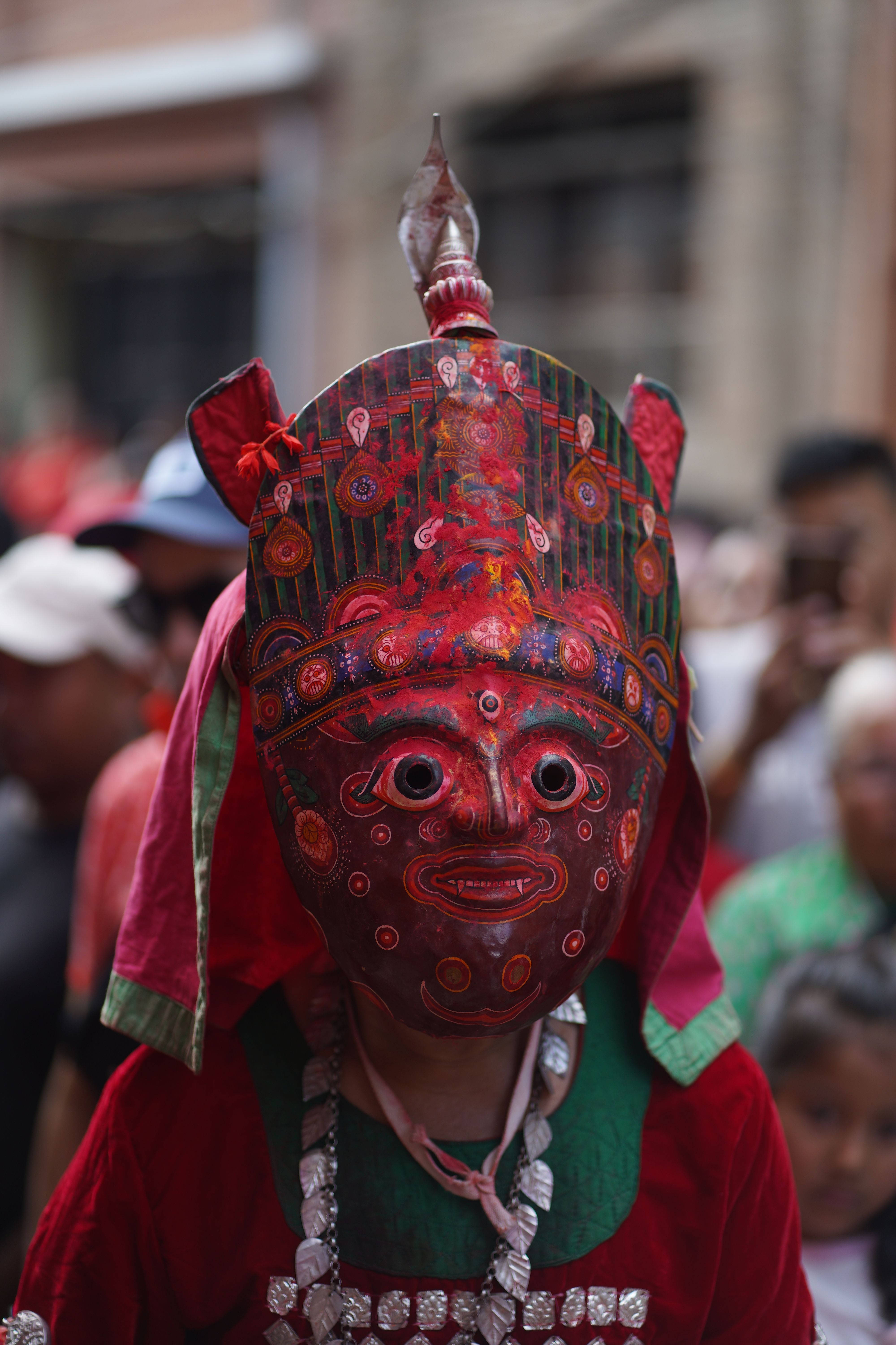 Vibrant depiction of a traditional masked dance during the Nil Barahi festival in Nepal.