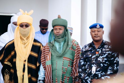 Free A diverse group in traditional and official attire in Nigeria, showcasing cultural diversity. Stock Photo