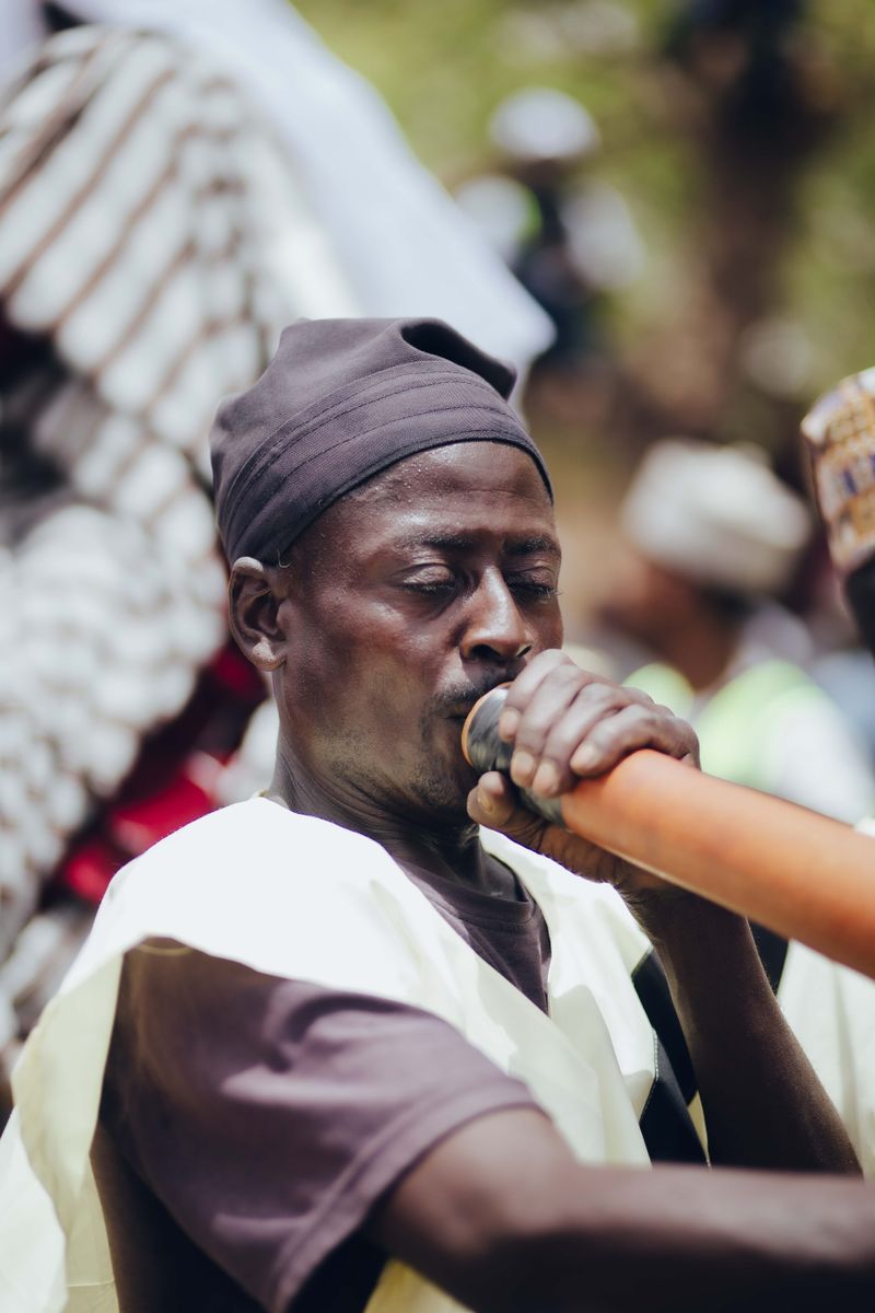 African Using Instrument African Traditional Instrument in Use · Free Stock Photo