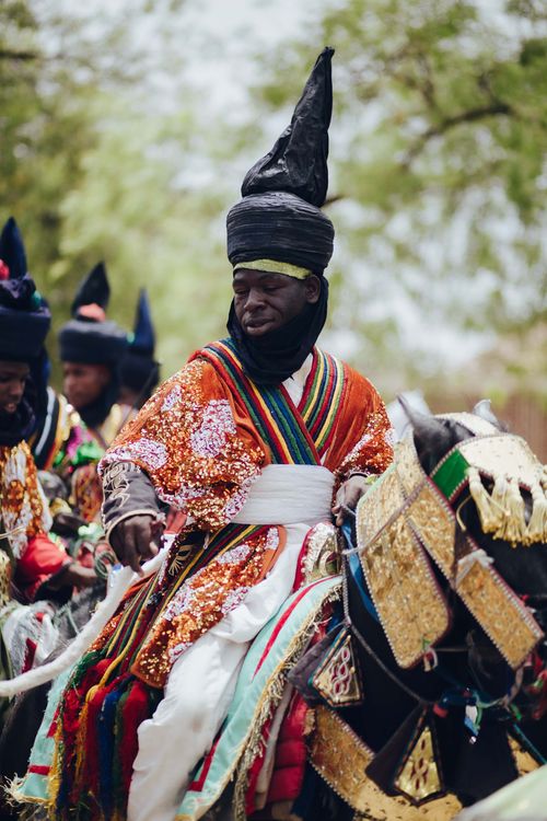 Free A vibrant scene at the Nigerian Durbar Festival with traditional attire and horses. Stock Photo