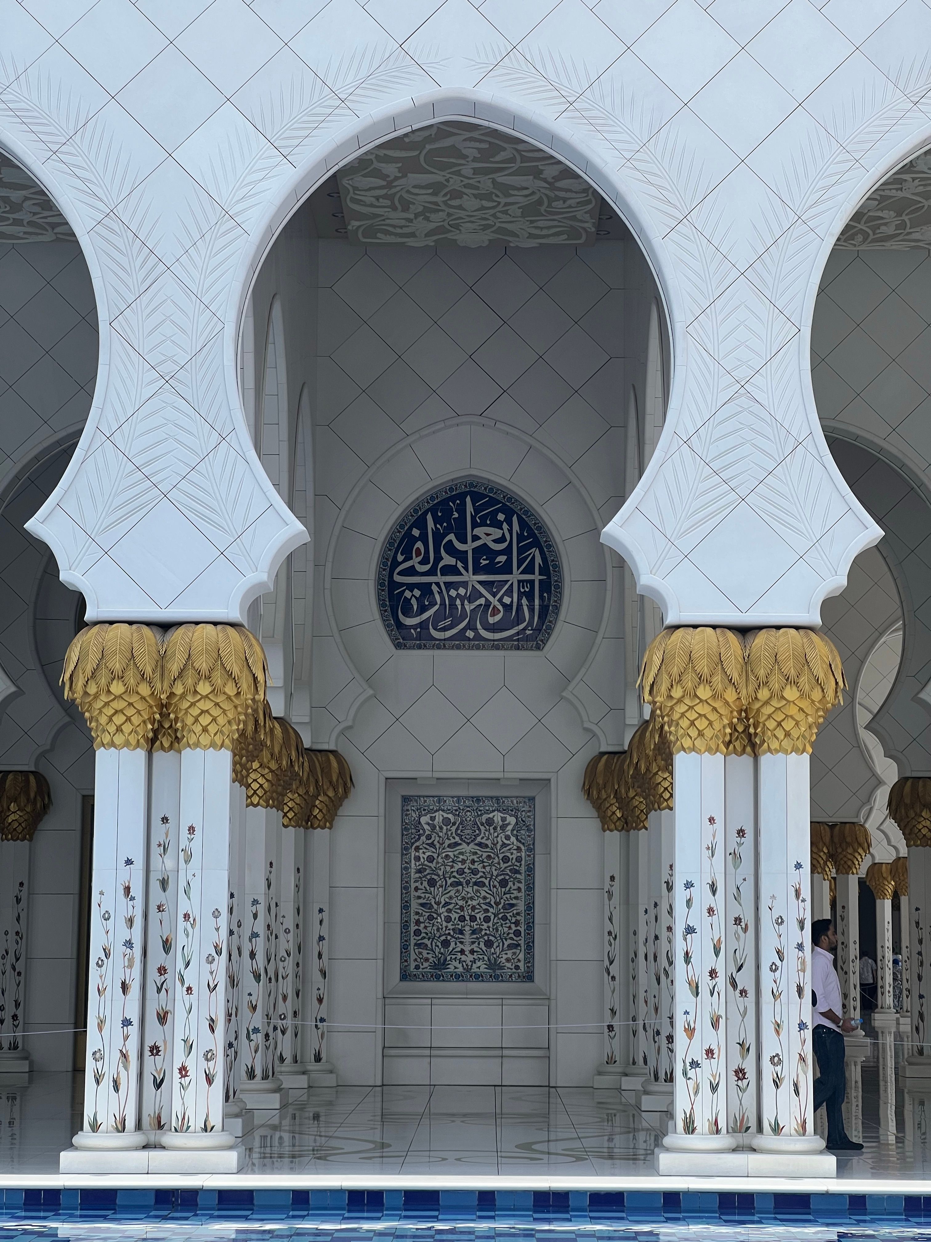 Stunning arches and ornate columns in Sheikh Zayed Grand Mosque, Abu Dhabi.