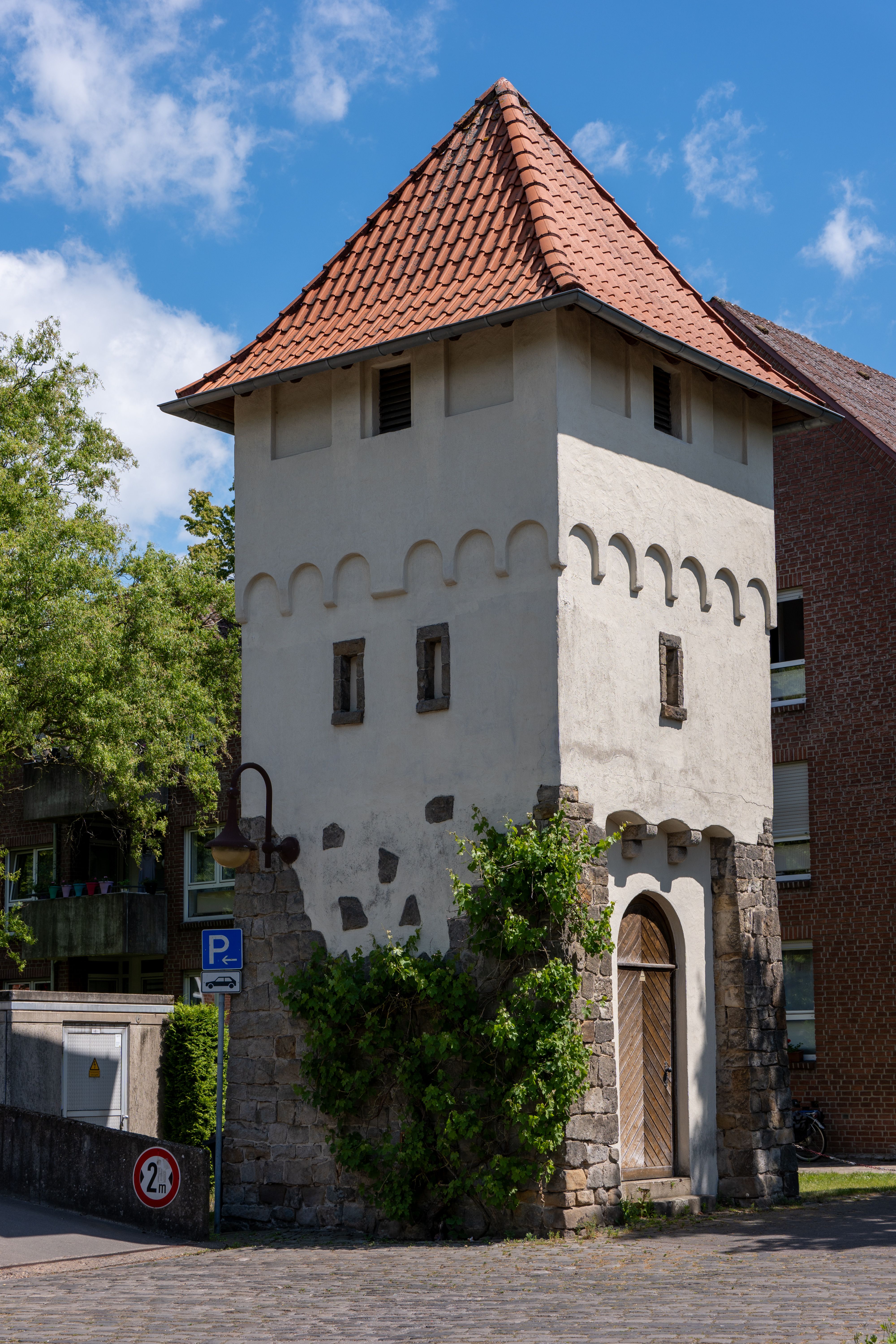 Medieval Tower with Red Tiled Roof in Cityscape · Free Stock Photo