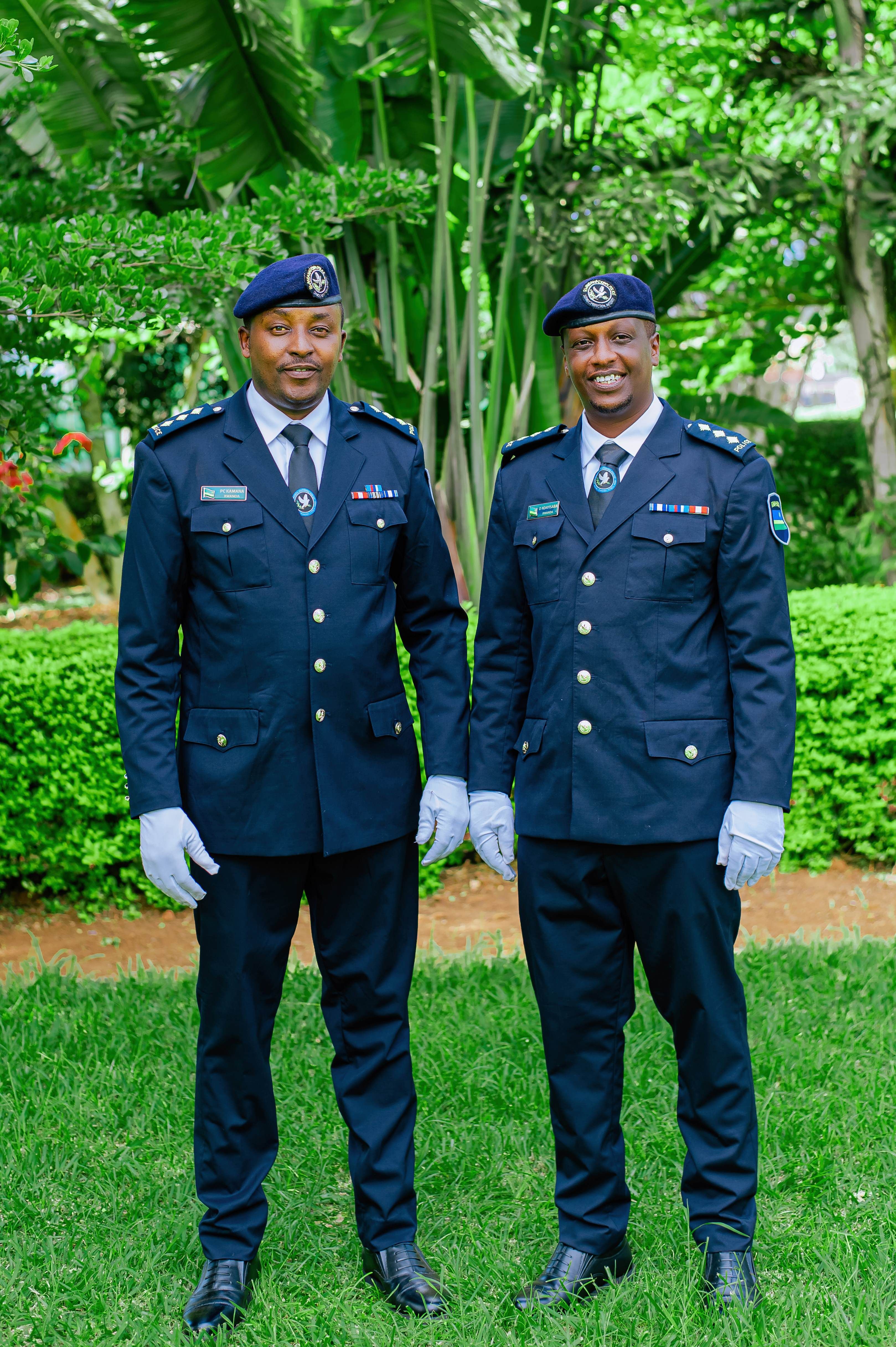 Police Officers in Formal Uniforms in Garden Setting · Free Stock Photo