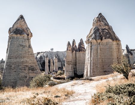 Explore the surreal rock formations of Cappadocia, Turkey, captured in this stunning landscape photo.