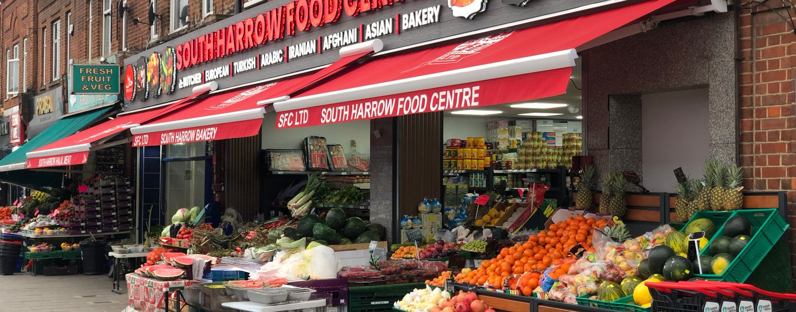 Vibrant display of fruits and vegetables at South Harrow Food Centre.