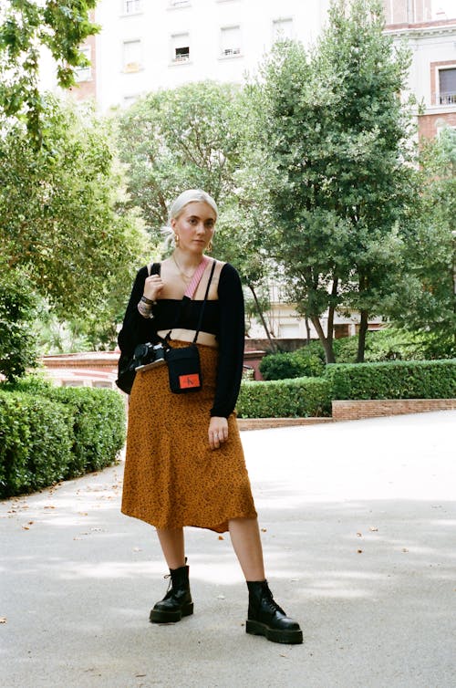 Free Photo Of Woman Wearing Brown Skirt Stock Photo