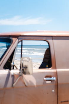 A vintage van parked by the beach in Corpus Christi, Texas, offering a retro coastal vibe.