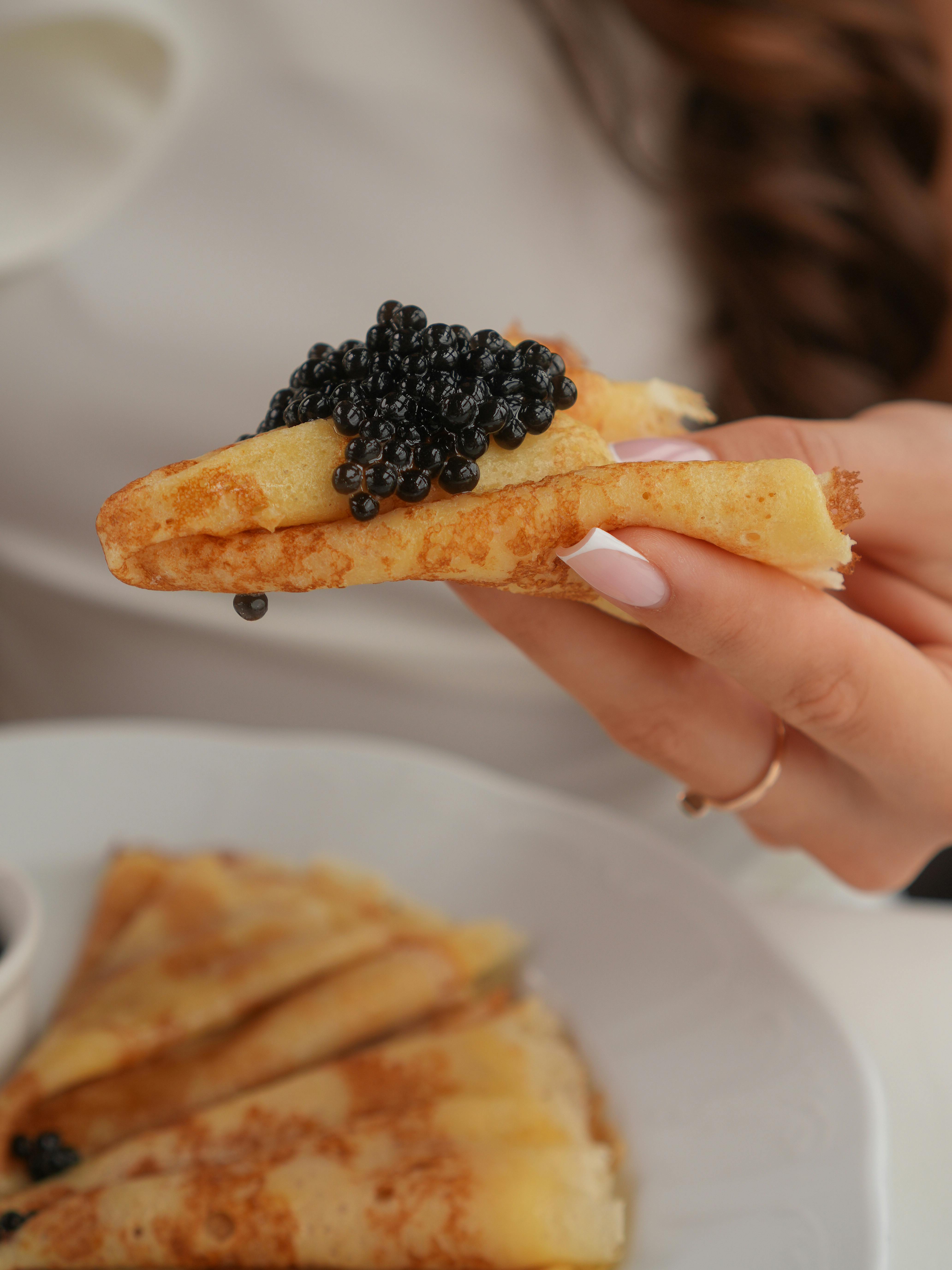 crepe topped with imitation caviar made with black beluga lentils