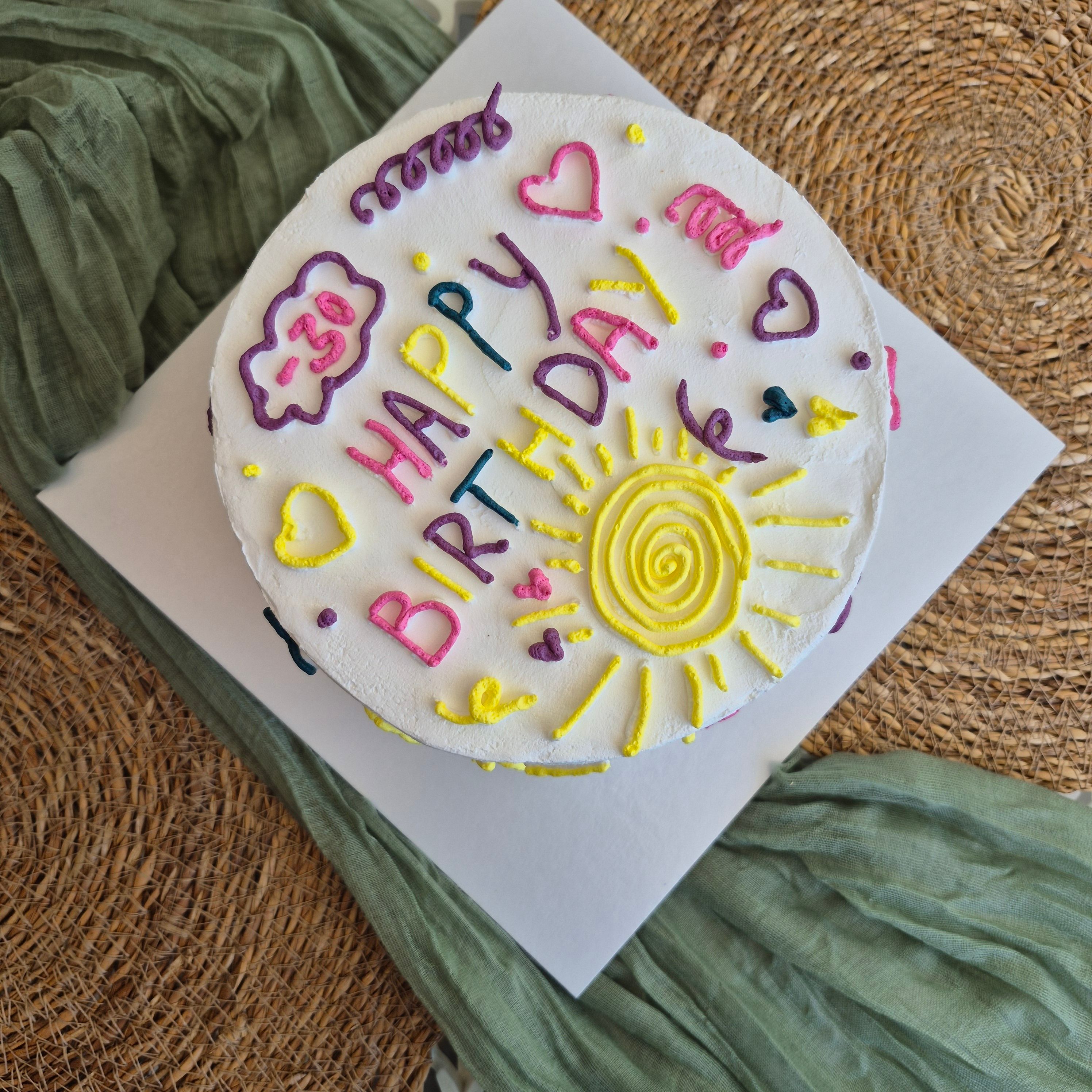 Colorful Birthday Cake with Decorative Icing · Free Stock Photo