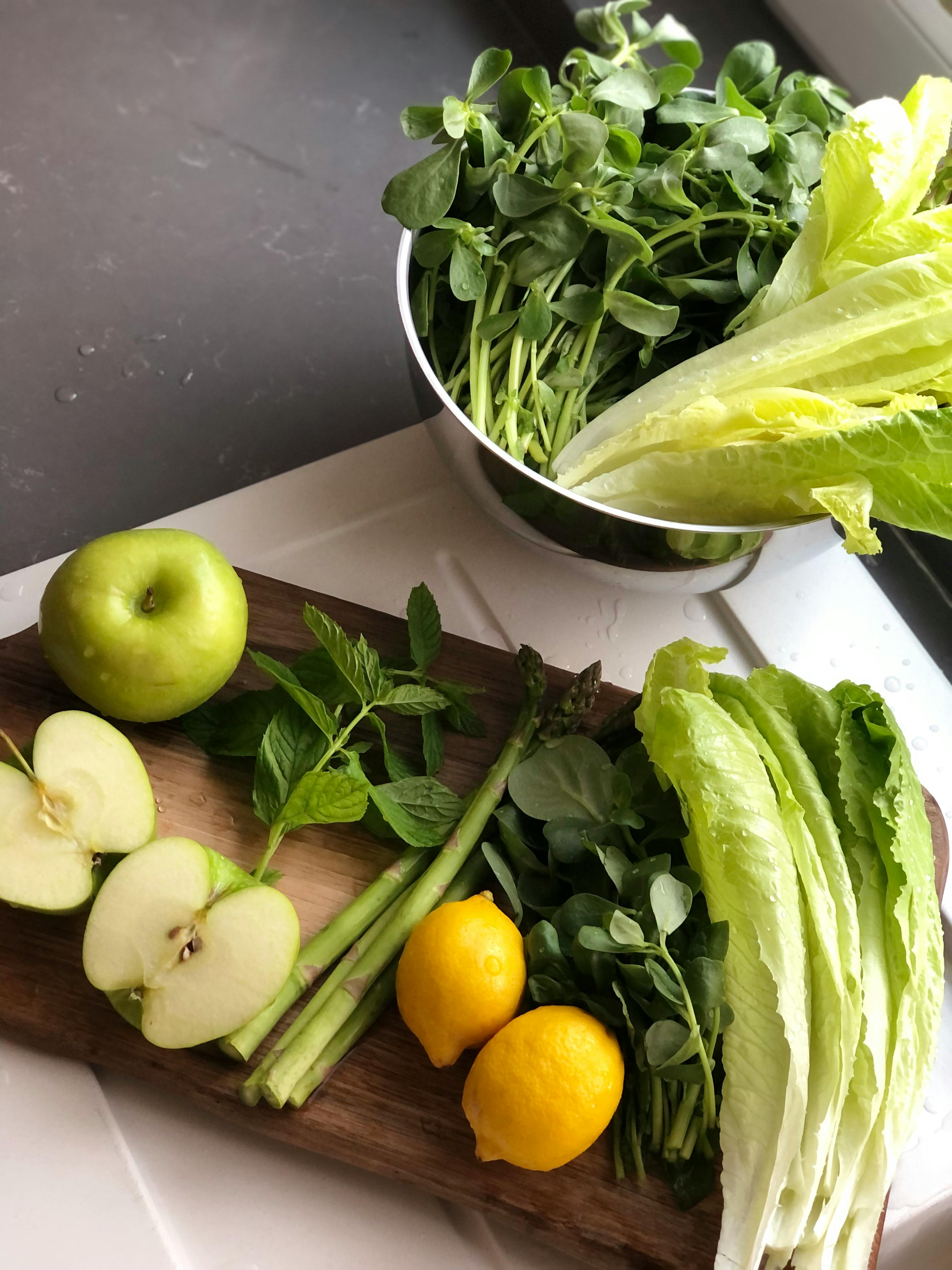 Fresh fruit and vegetables on a kitchen counter emphasizing food water content