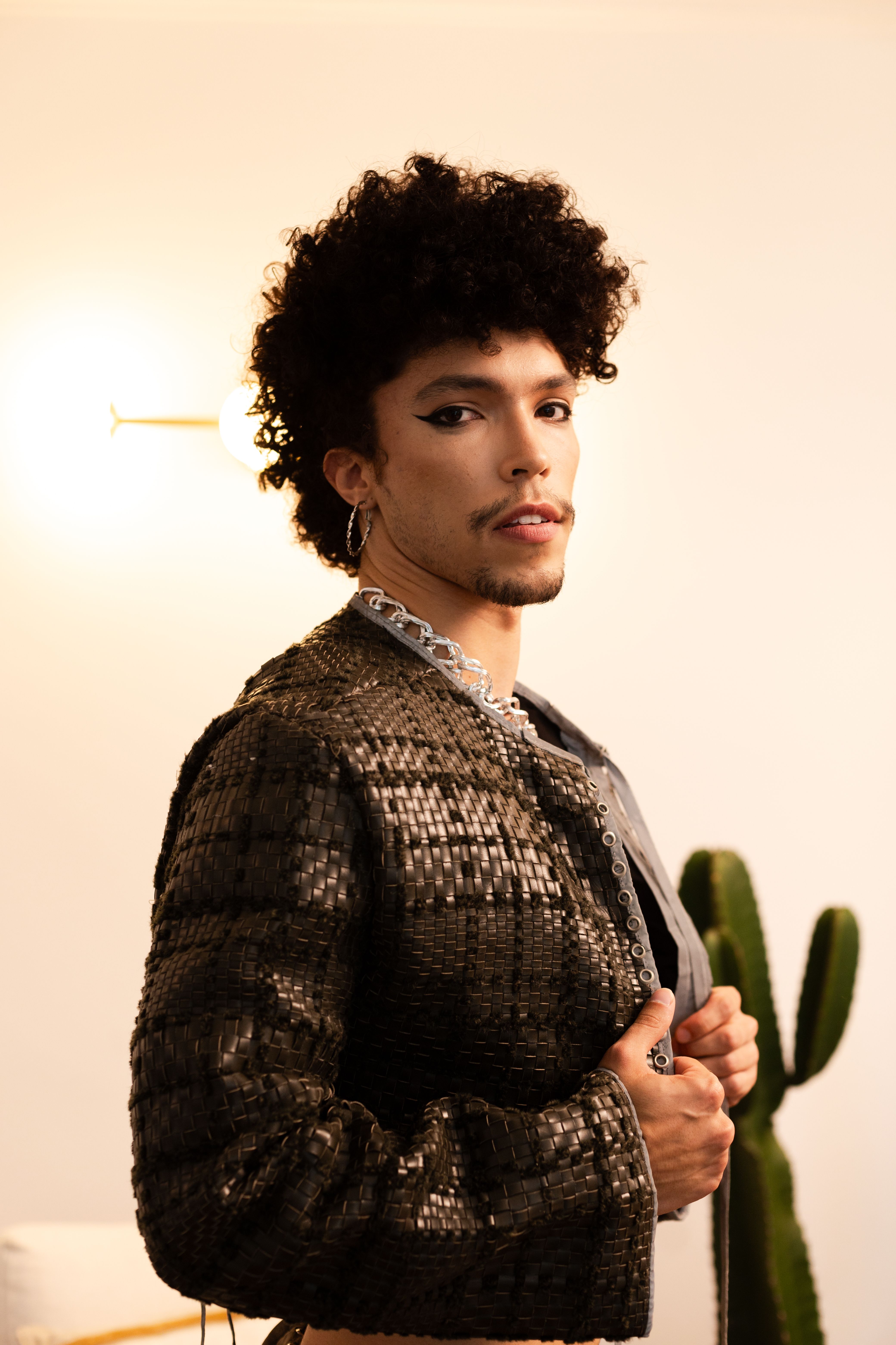 Portrait of a fashionable person with unique style indoors in São Paulo, Brasil.