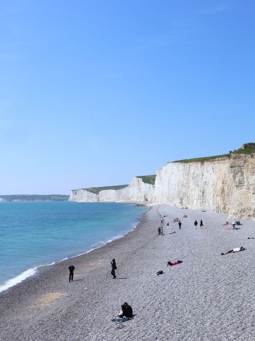 Free Explore the stunning natural beauty of Birling Gap with its iconic white cliffs and pebble beach. Stock Photo