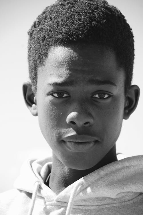 Grayscale Photography of Boy Wearing Pullover Hoodie