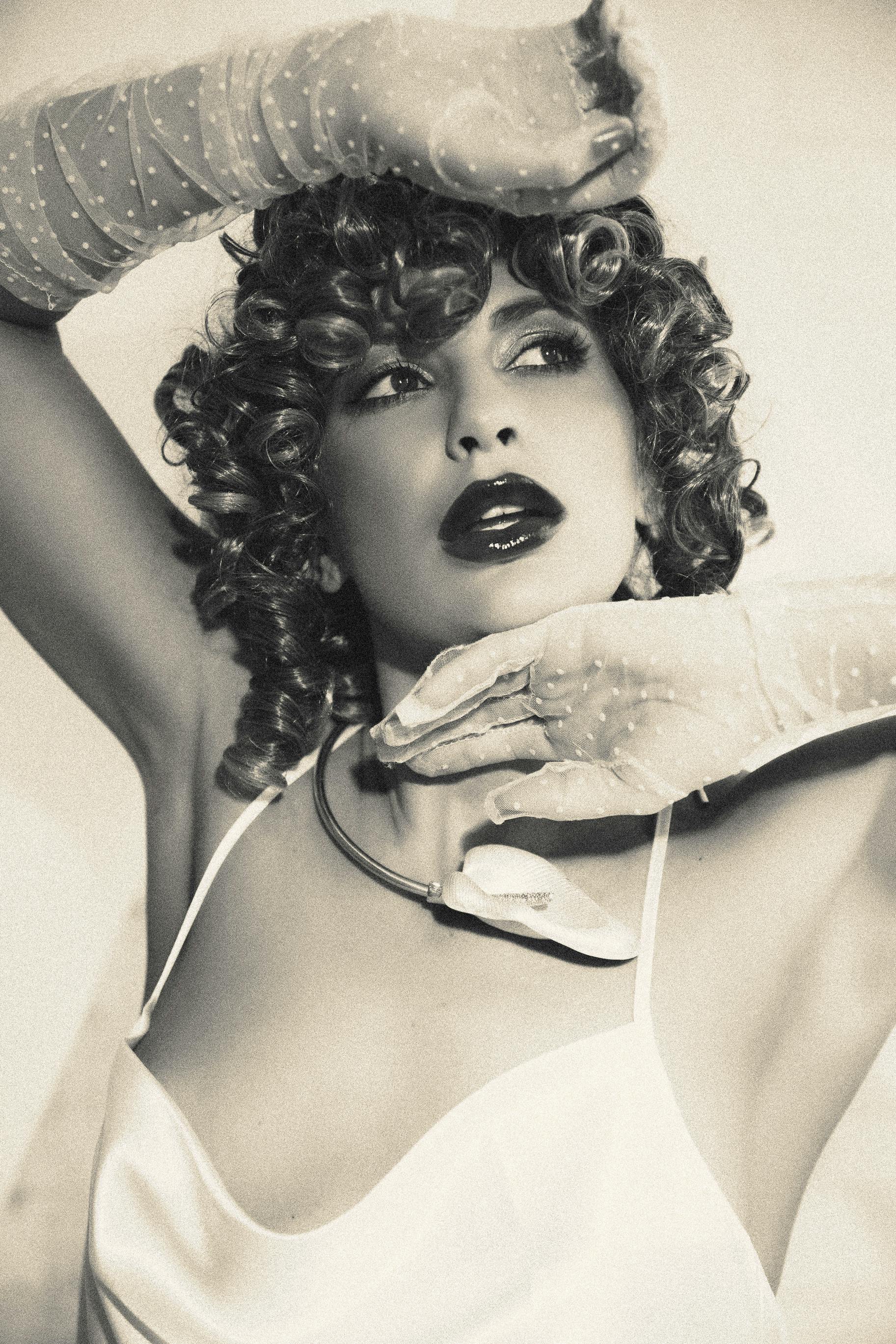 Timeless black and white portrait capturing vintage style elegance.