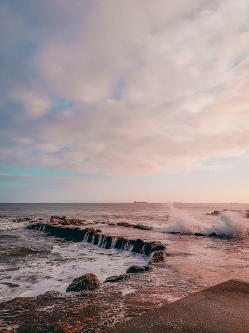 Photo Of Seaside During Dawn