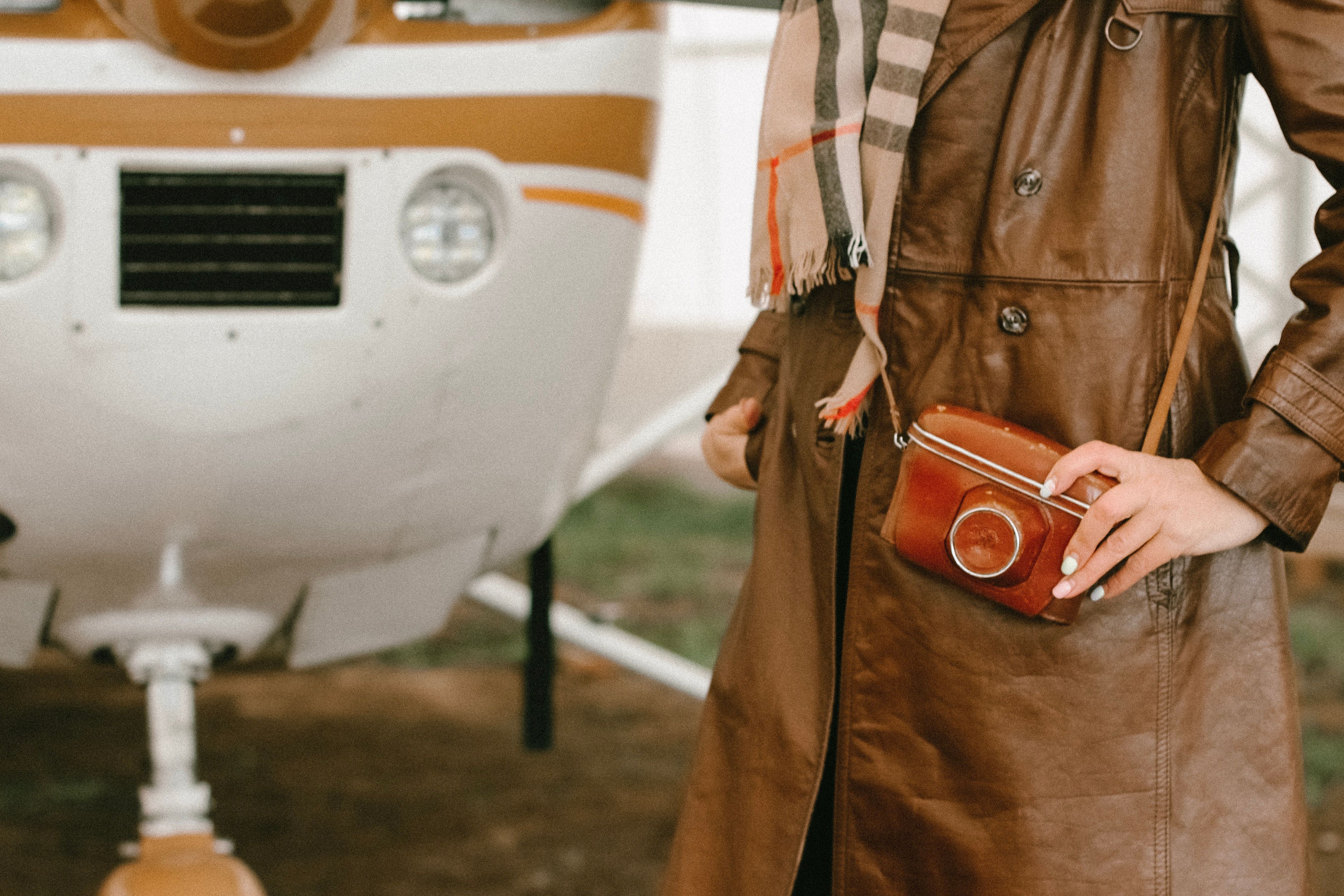 Photo of Person Wearing Brown Trench Coat · Free Stock Photo