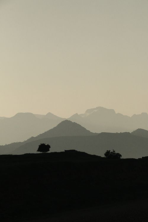 Free A serene silhouette of mountains at twilight in Khuzestan Province, Iran. Stock Photo