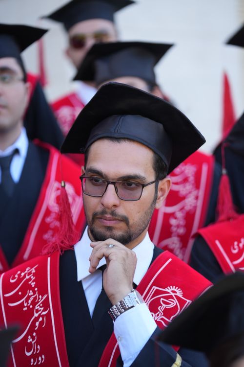 Free Students in graduation gowns during a ceremony in Iran, showcasing cultural attire. Stock Photo