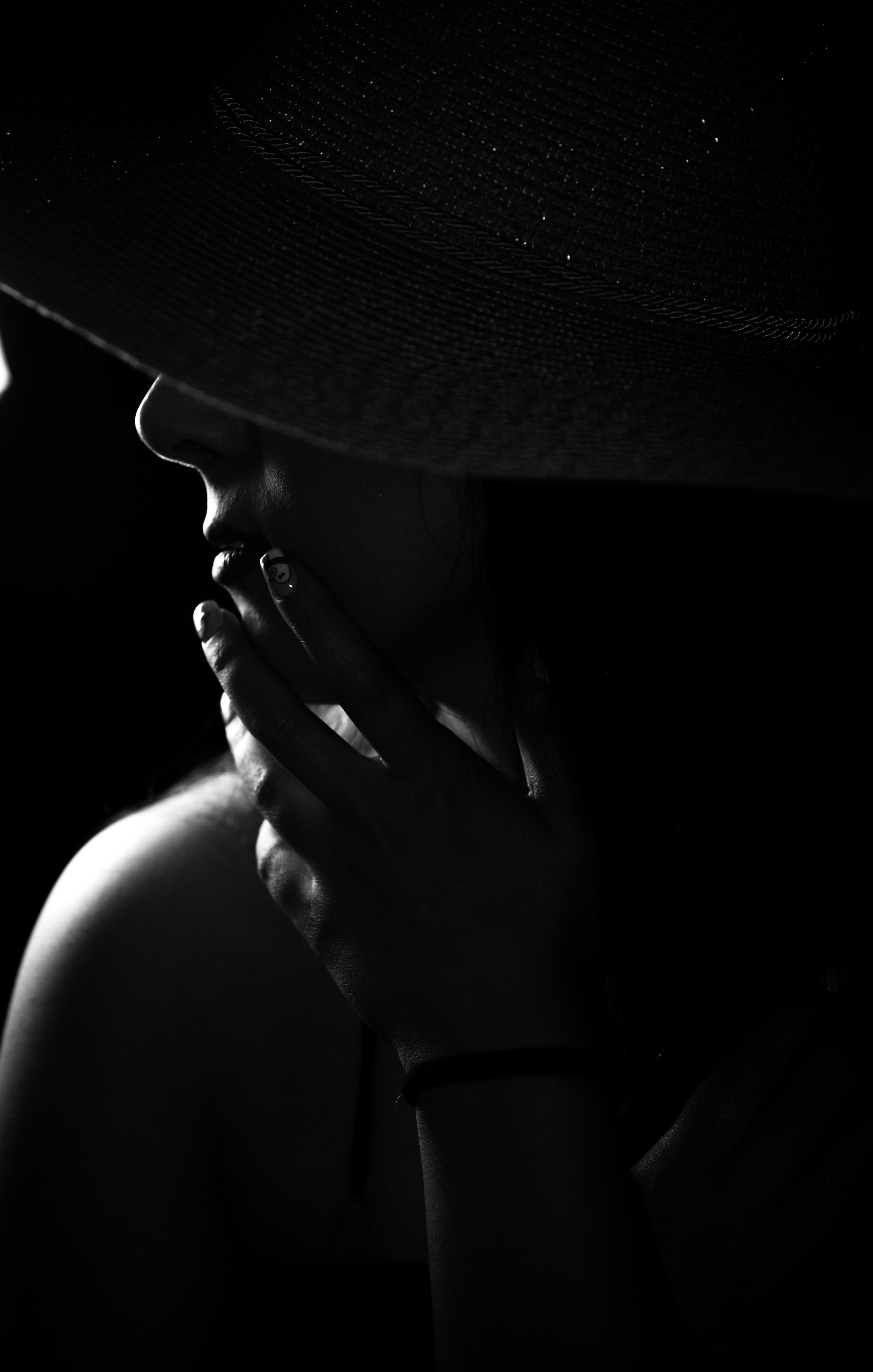 Striking Black and White Portrait of Woman in Shadow · Free Stock Photo