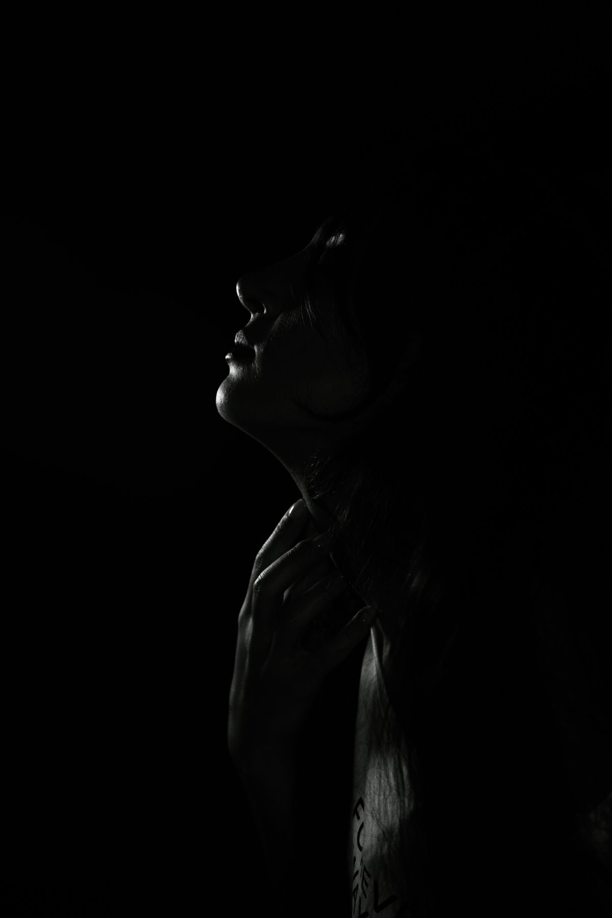 Woman Portrait in Darkness · Free Stock Photo