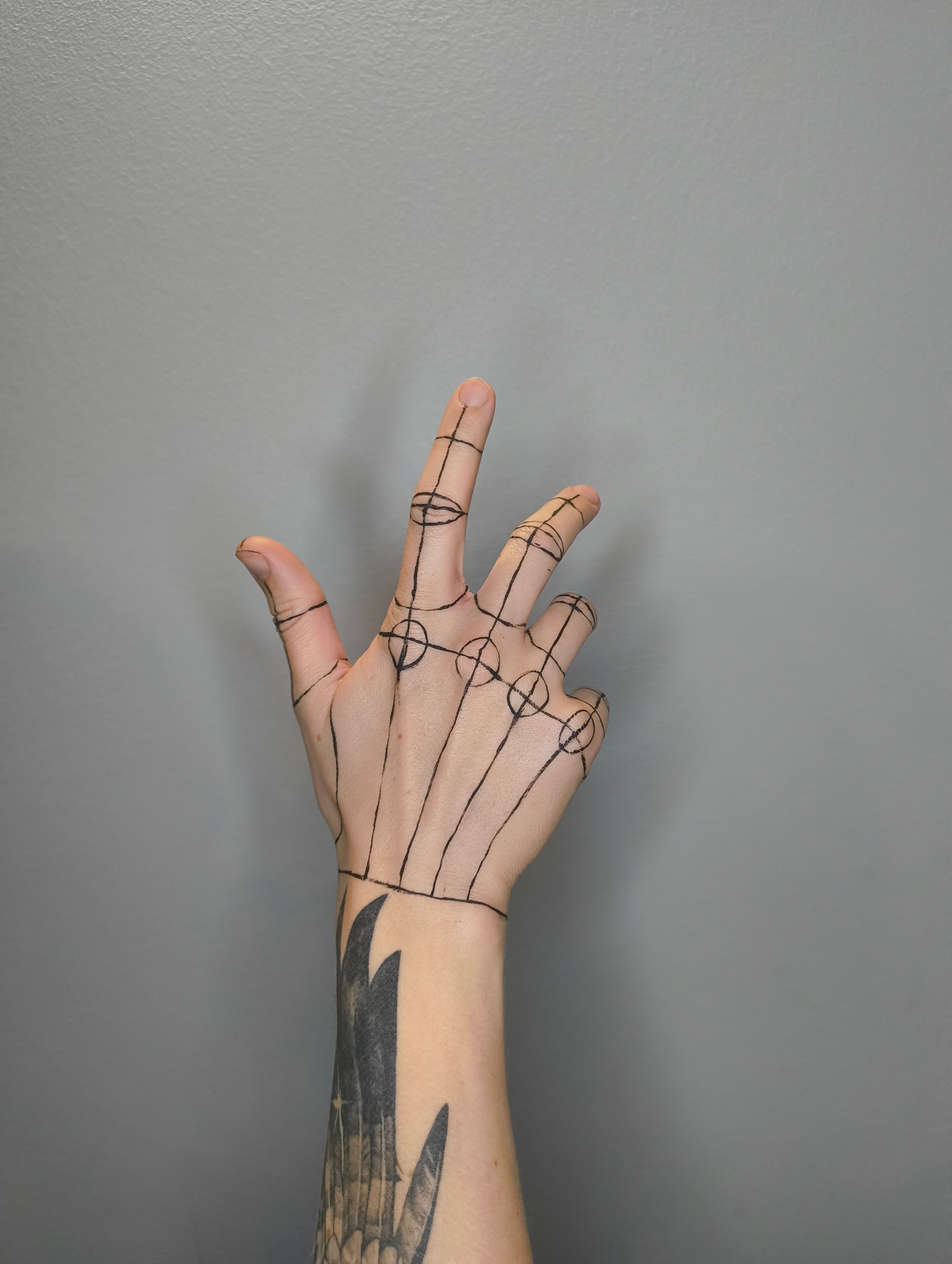 Fine line botanical tattoo