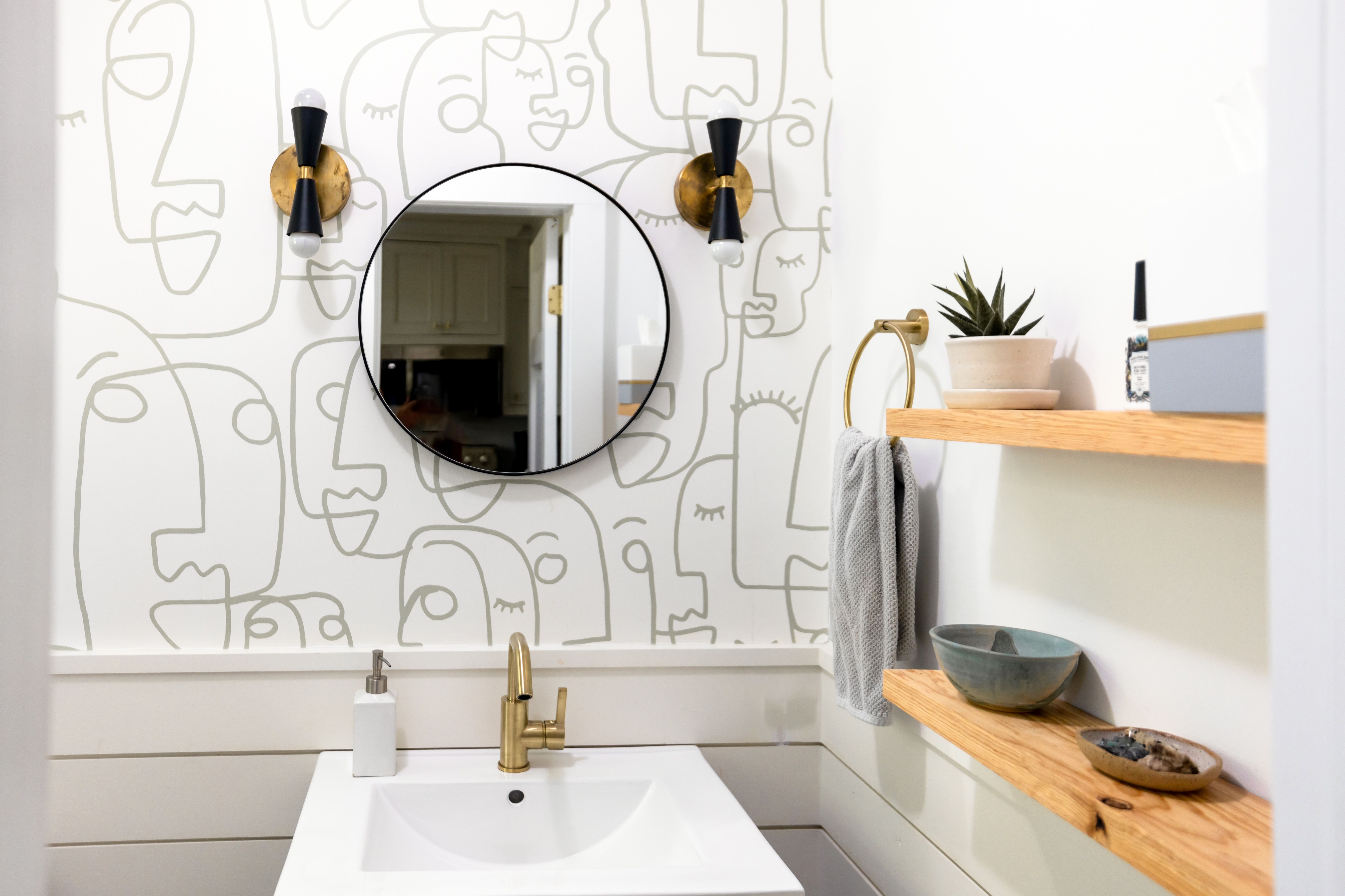 Modern small bathroom design in Columbus Ohio featuring space-saving fixtures and stylish tile accents by Andrea Davis