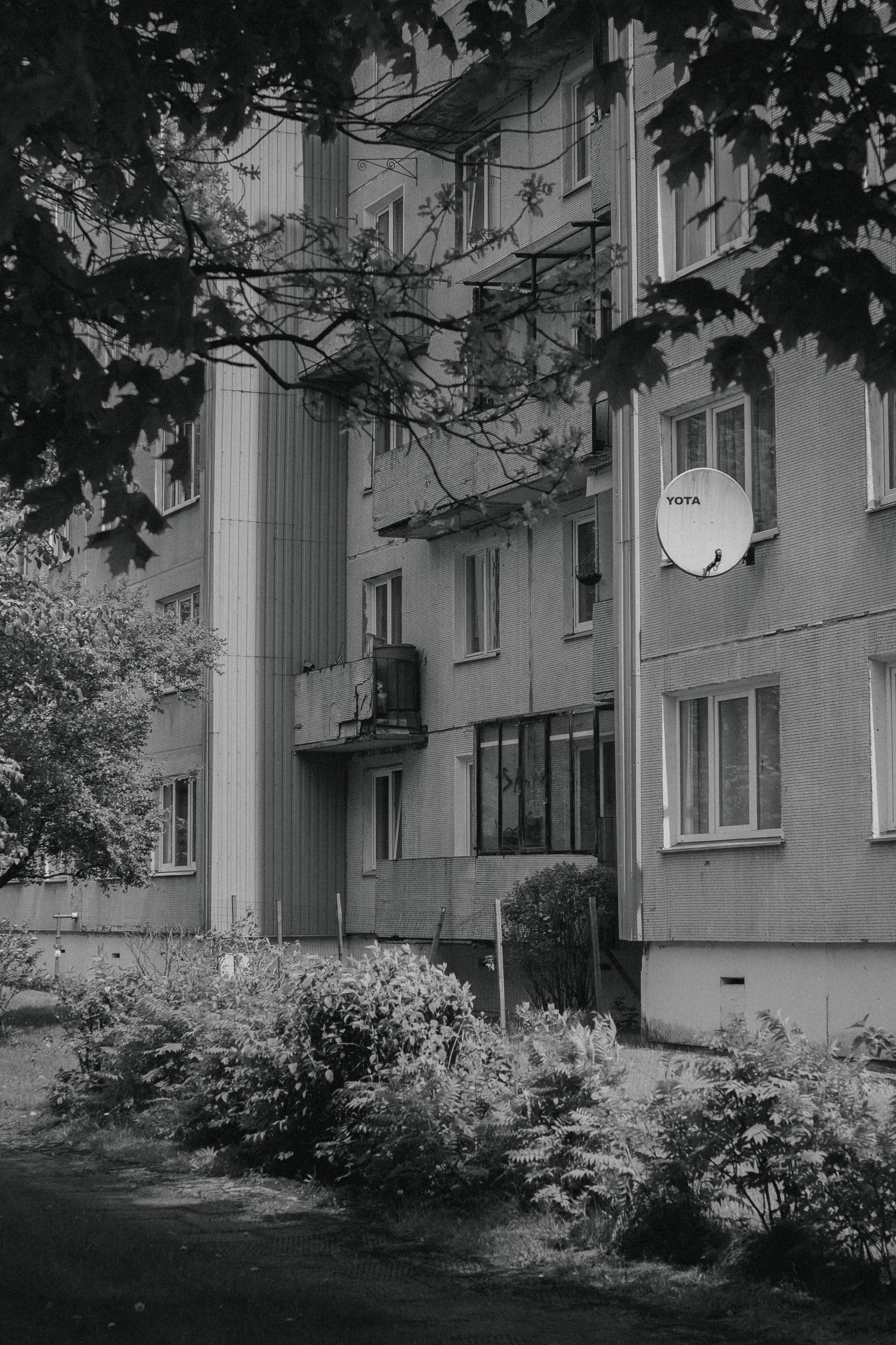 Image showcasing Urban Black and White Apartment Building Exterior · Free Stock Photo