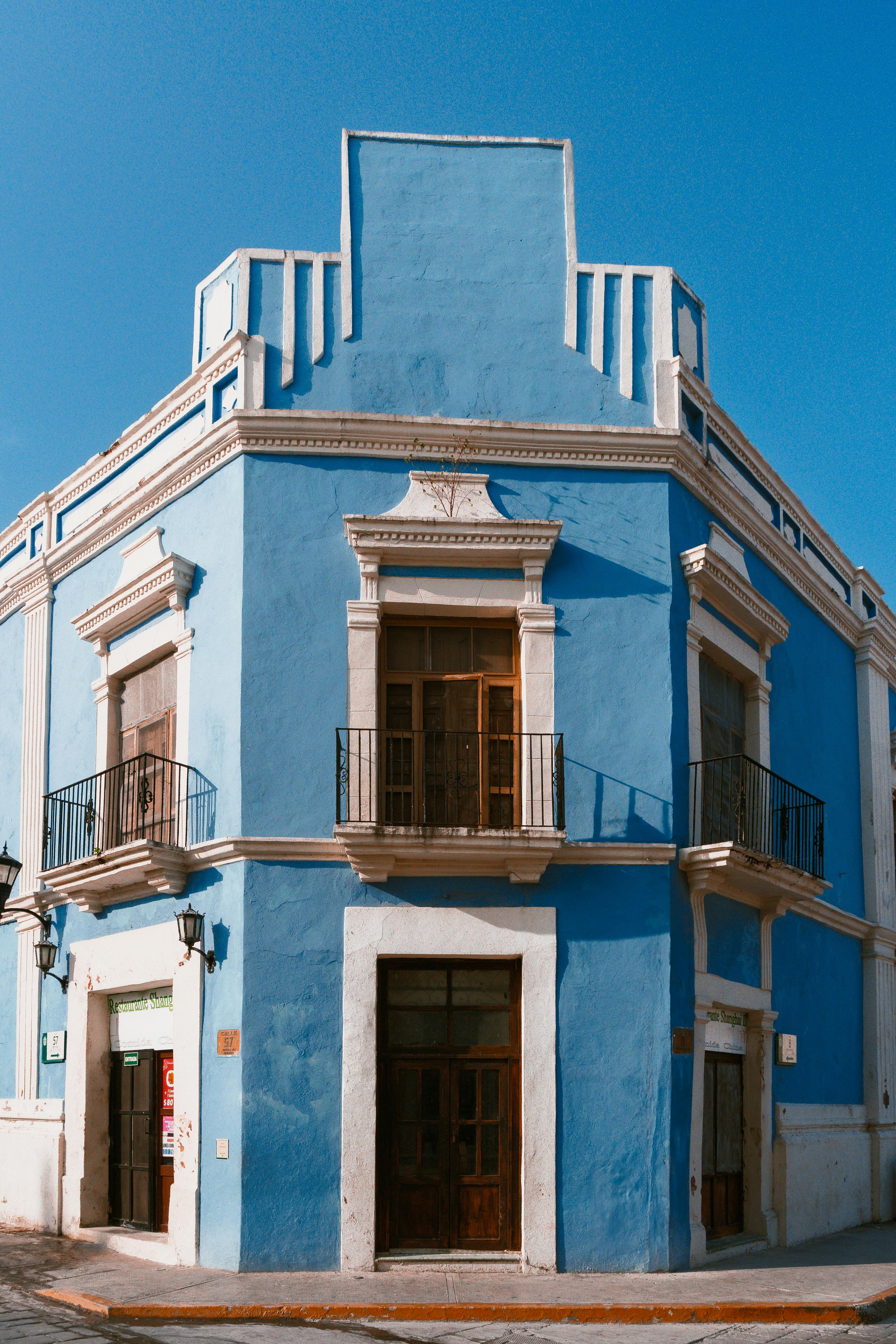 Free Vibrant blue colonial building in San Francisco de Campeche under clear sky, showcasing beautiful architecture. Stock Photo