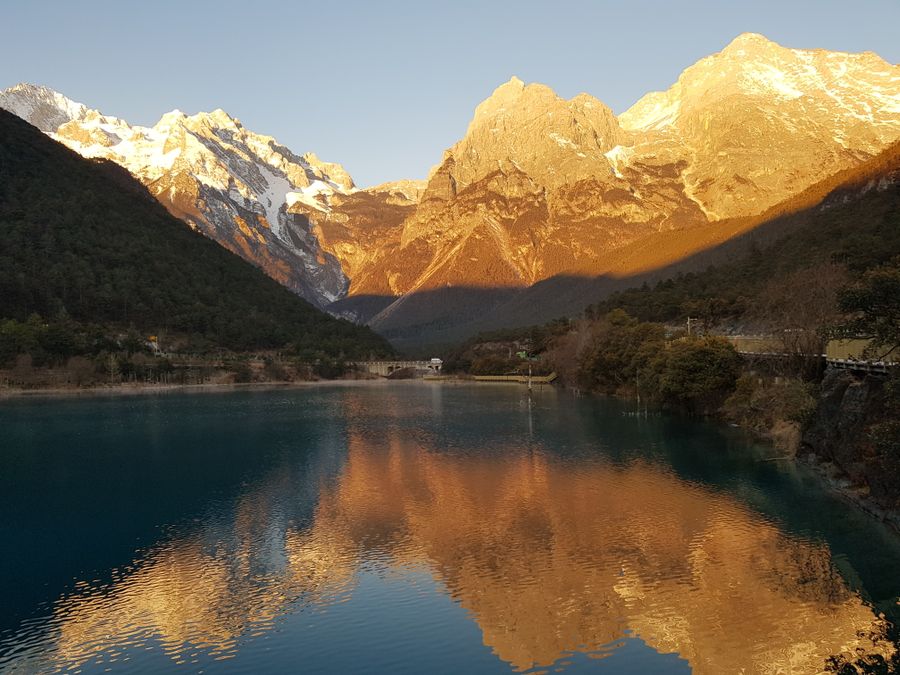 Lijiang snow mountain and lake reflection