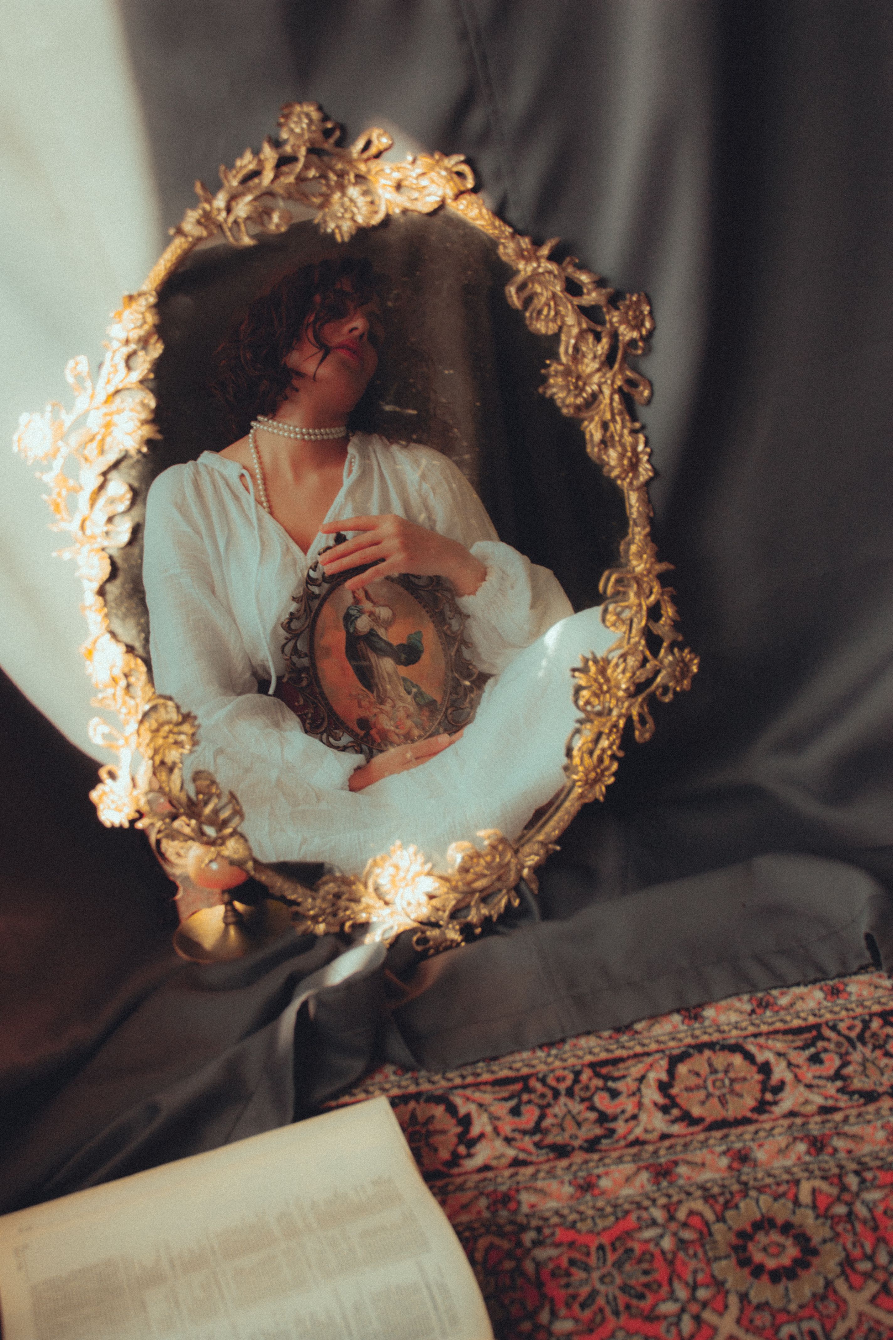 Artistic Reflection in Ornate Vintage Mirror · Free Stock Photo