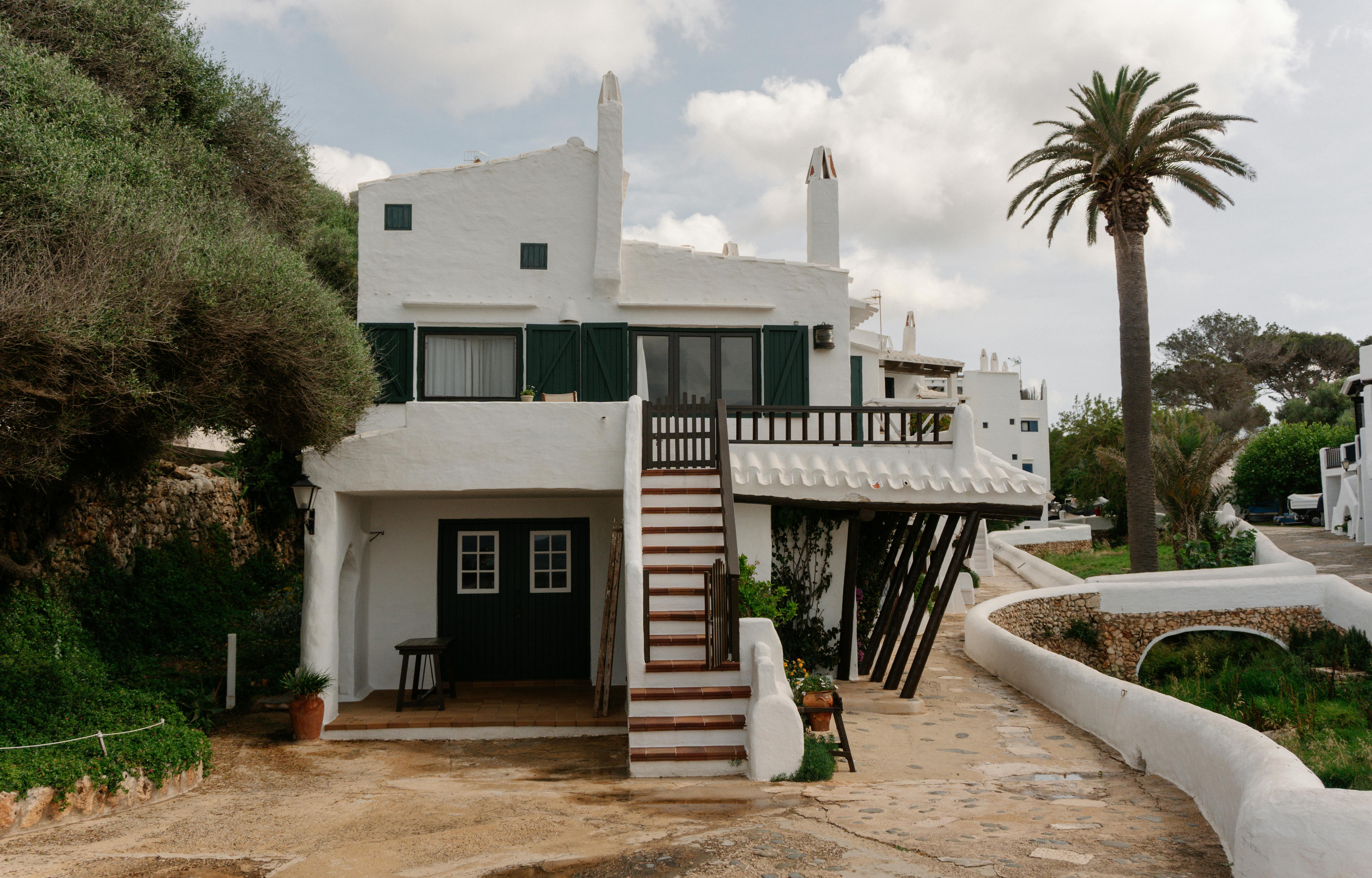 Charming white villa in Ciutadella de Menorca with traditional architecture.