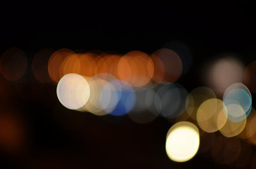 Orange, White, Blue, and Yellow Light Bokeh