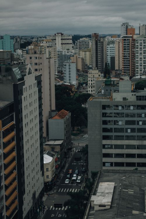Free Dramatic cityscape of São Paulo showcasing high-rise buildings under cloudy skies. Stock Photo