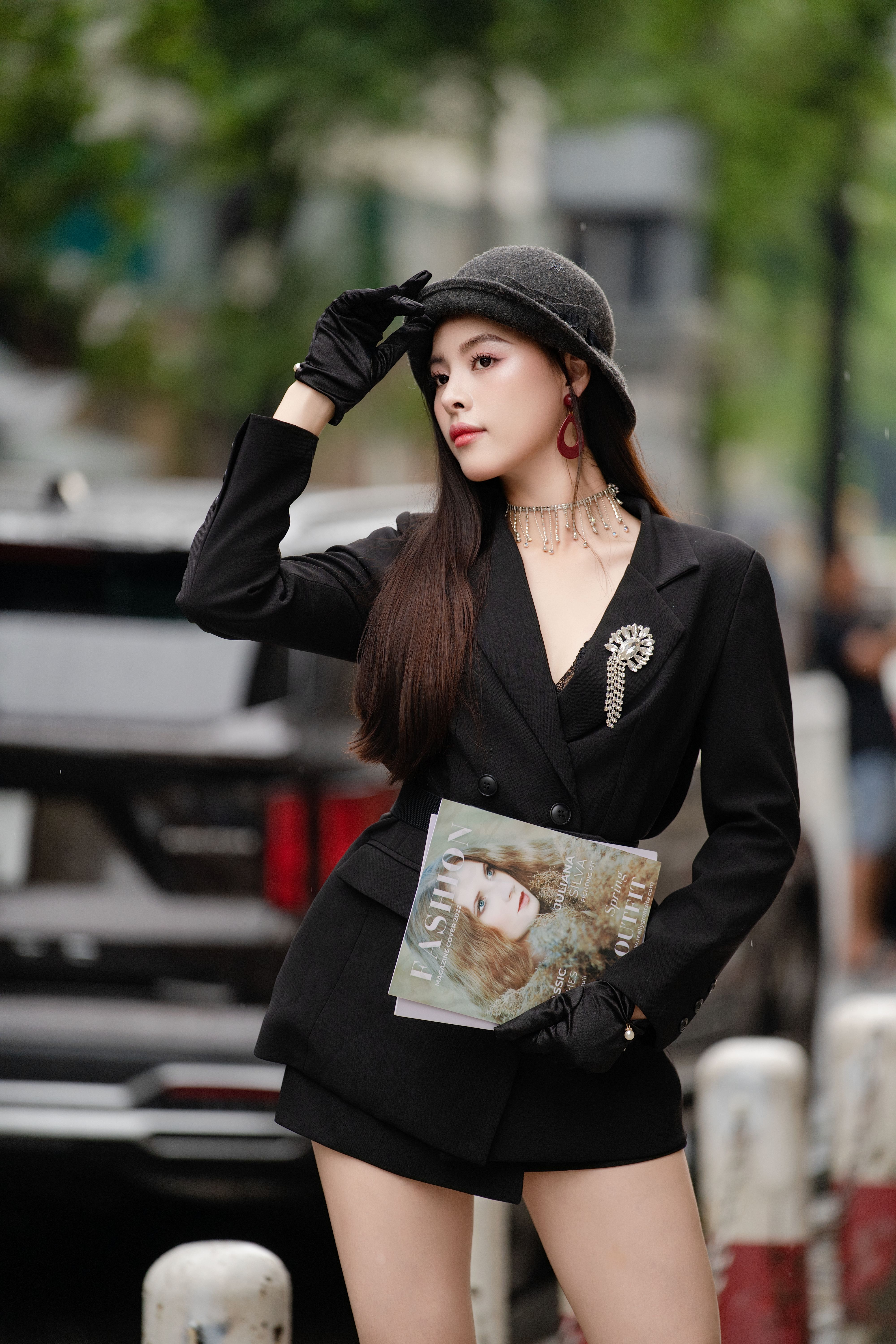 Stylish Woman in Elegant Black Outfit Outdoors · Free Stock Photo