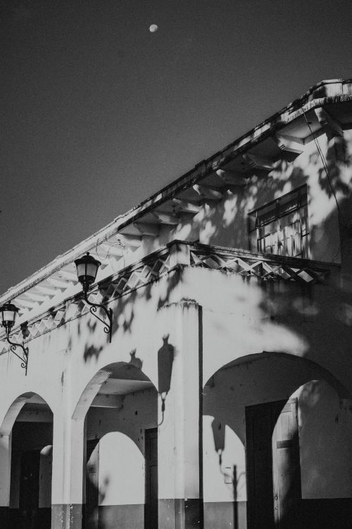 Free Black and white photo of colonial architecture with moon in Comitán de Domínguez, Chiapas, México. Stock Photo