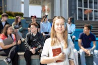 University Students Socializing Outdoors on Campus