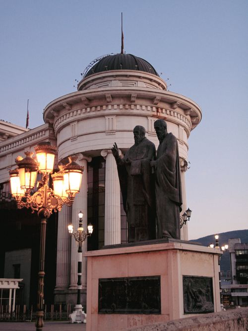 Free Dramatic evening view of iconic statues and architecture in Skopje, North Macedonia. Stock Photo