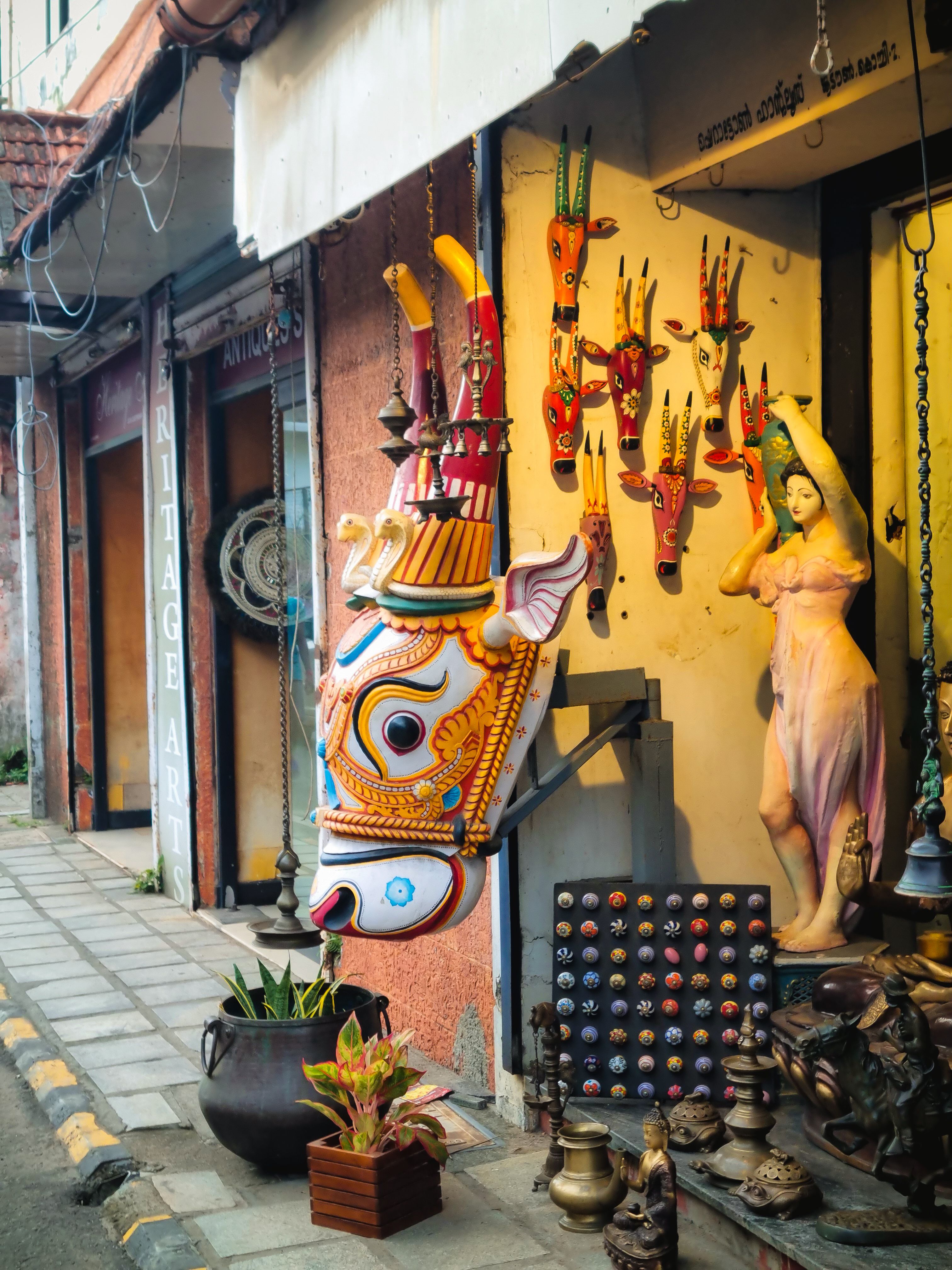 Colorful Artisan Shop with Decorative Masks · Free Stock Photo