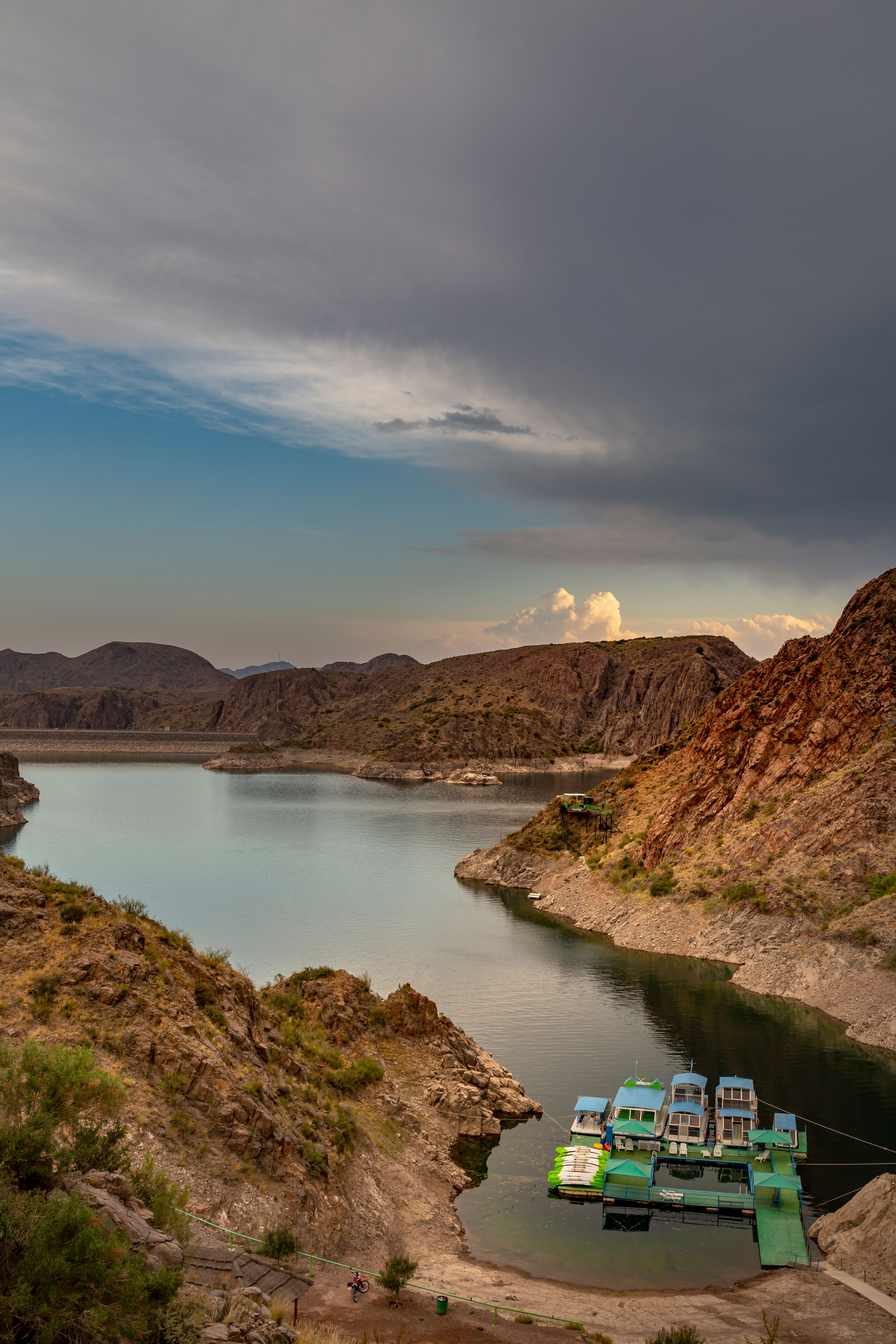 Scenic View of Mendoza Lake and Mountains at Sunset · Free Stock Photo