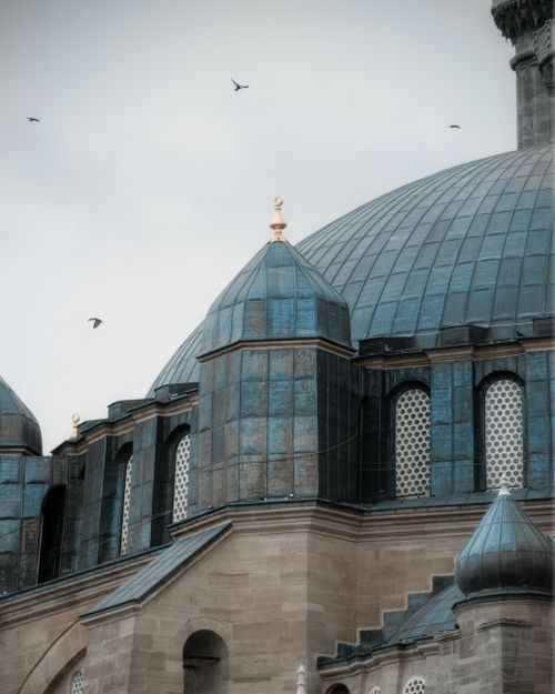 Free Elegant blue domes of a historic architectural landmark against a cloudy sky. Stock Photo