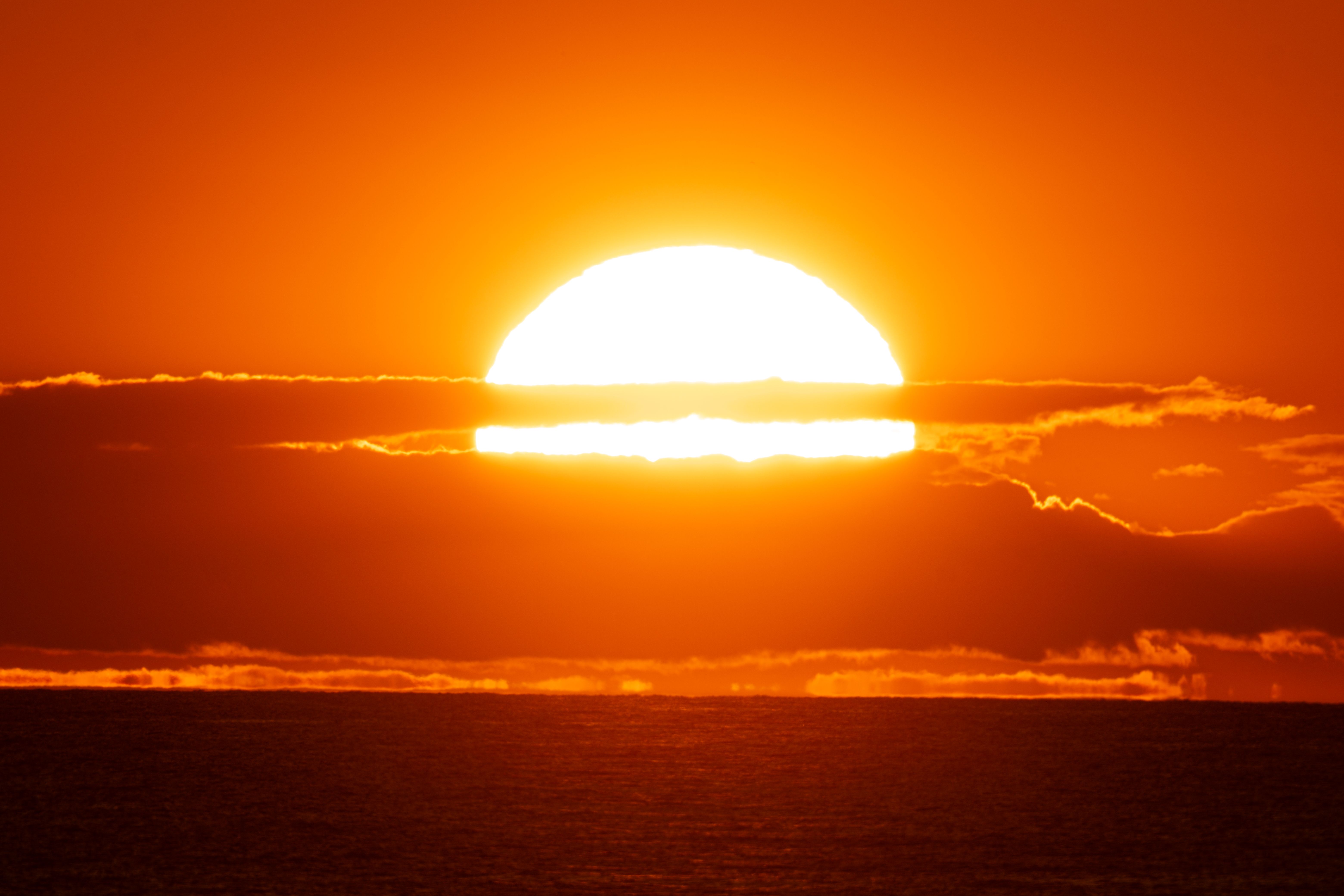 Dramatic Sunset Over Ocean With Fiery Horizon · Free Stock Photo