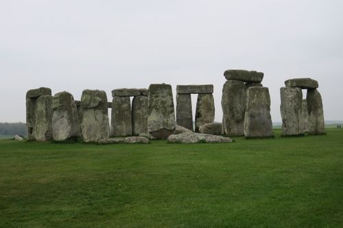 Free Captivating image of Stonehenge's ancient stone structure surrounded by lush greenery. Stock Photo
