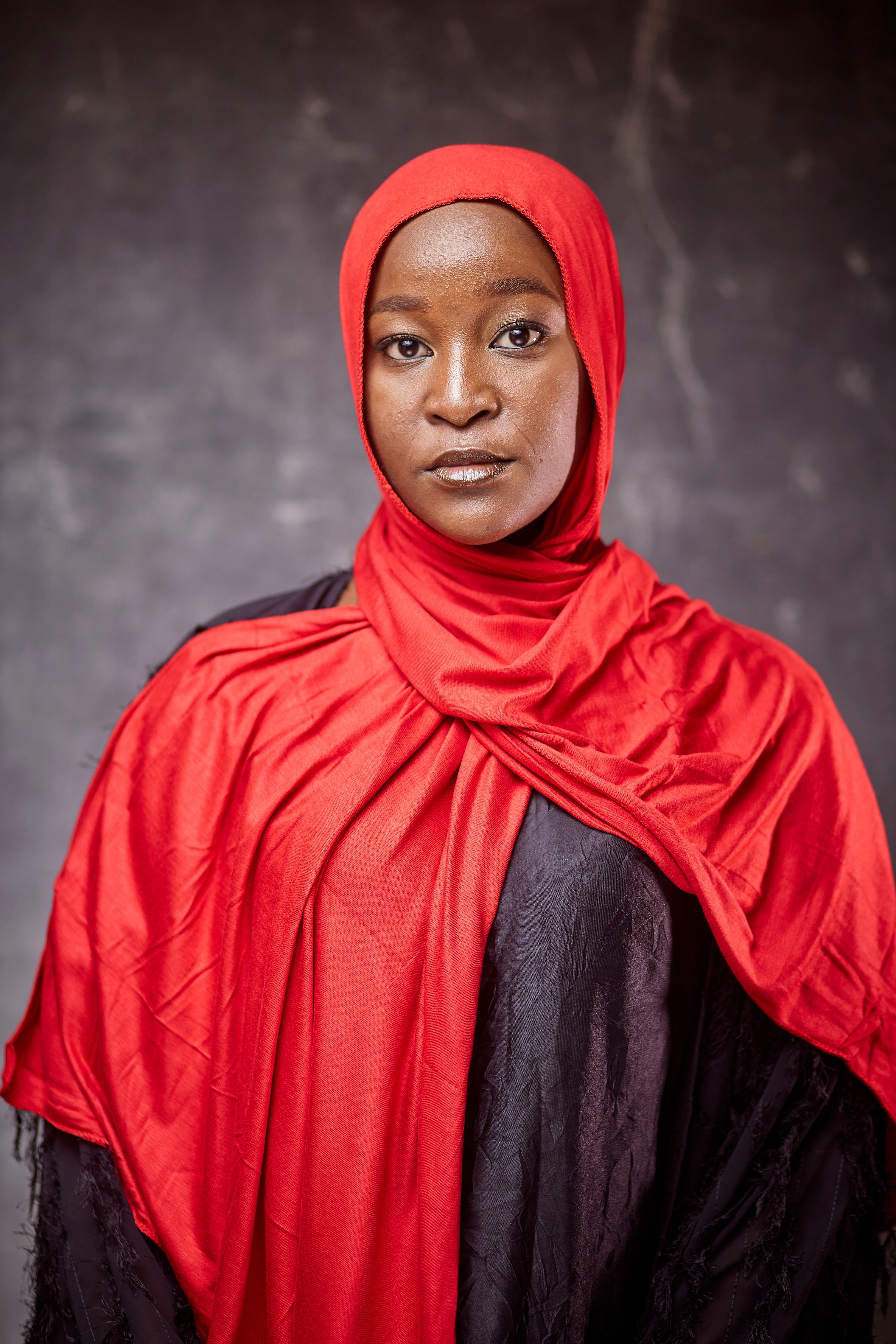 Portrait of Woman in Red and Black Hijab · Free Stock Photo